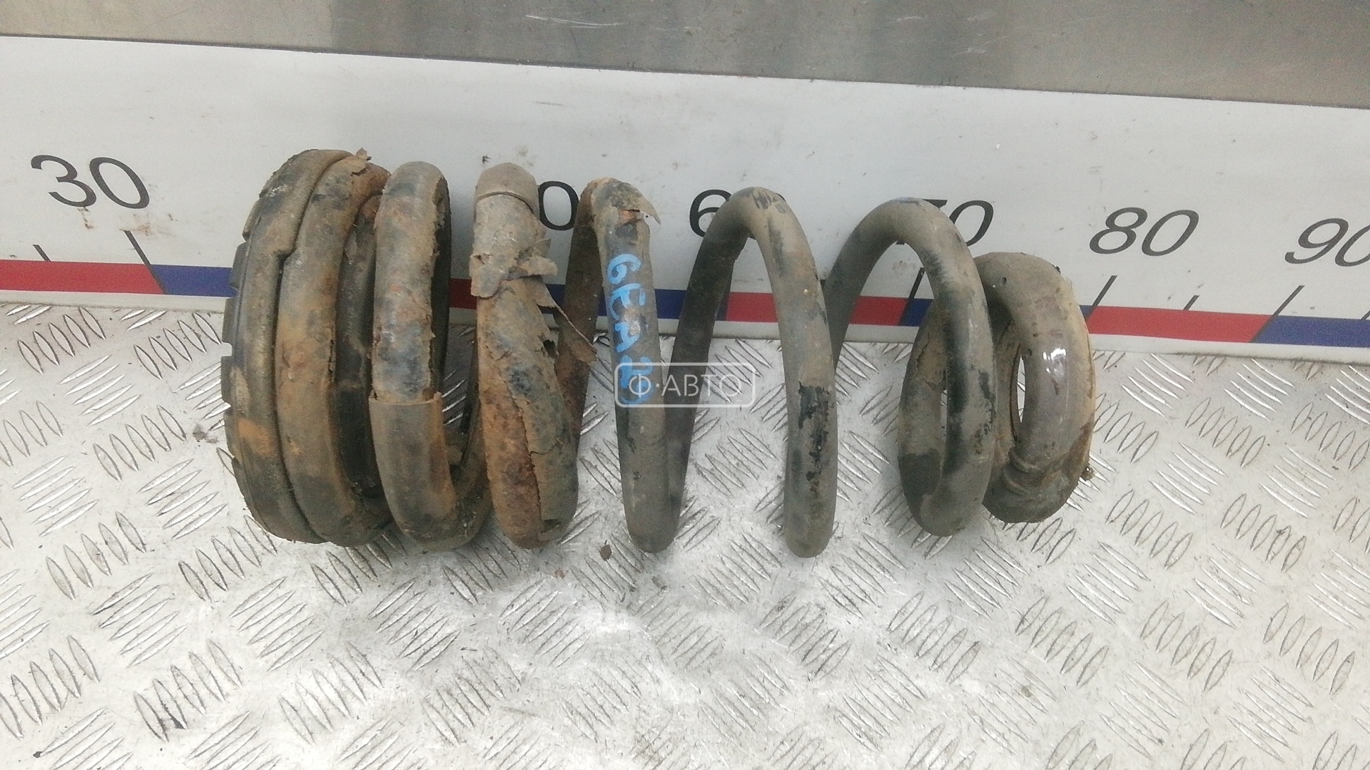 Пружина задняя