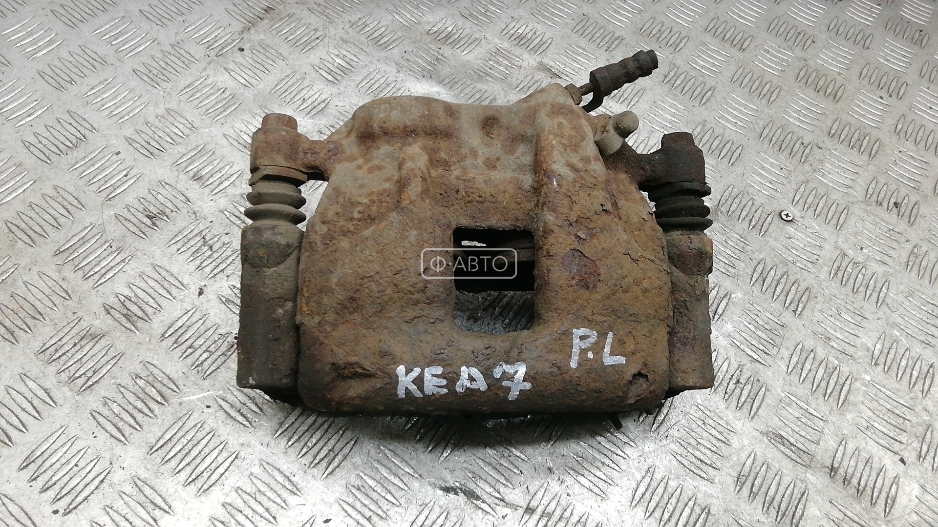 Суппорт тормозной передний левый