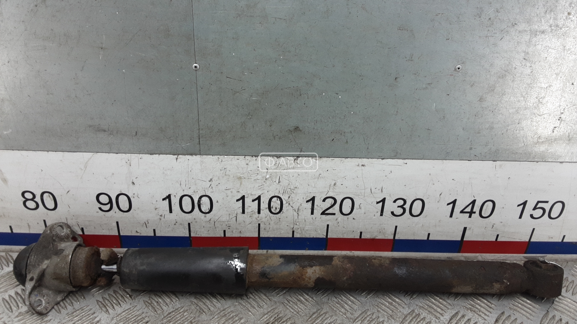 Амортизатор задней балки