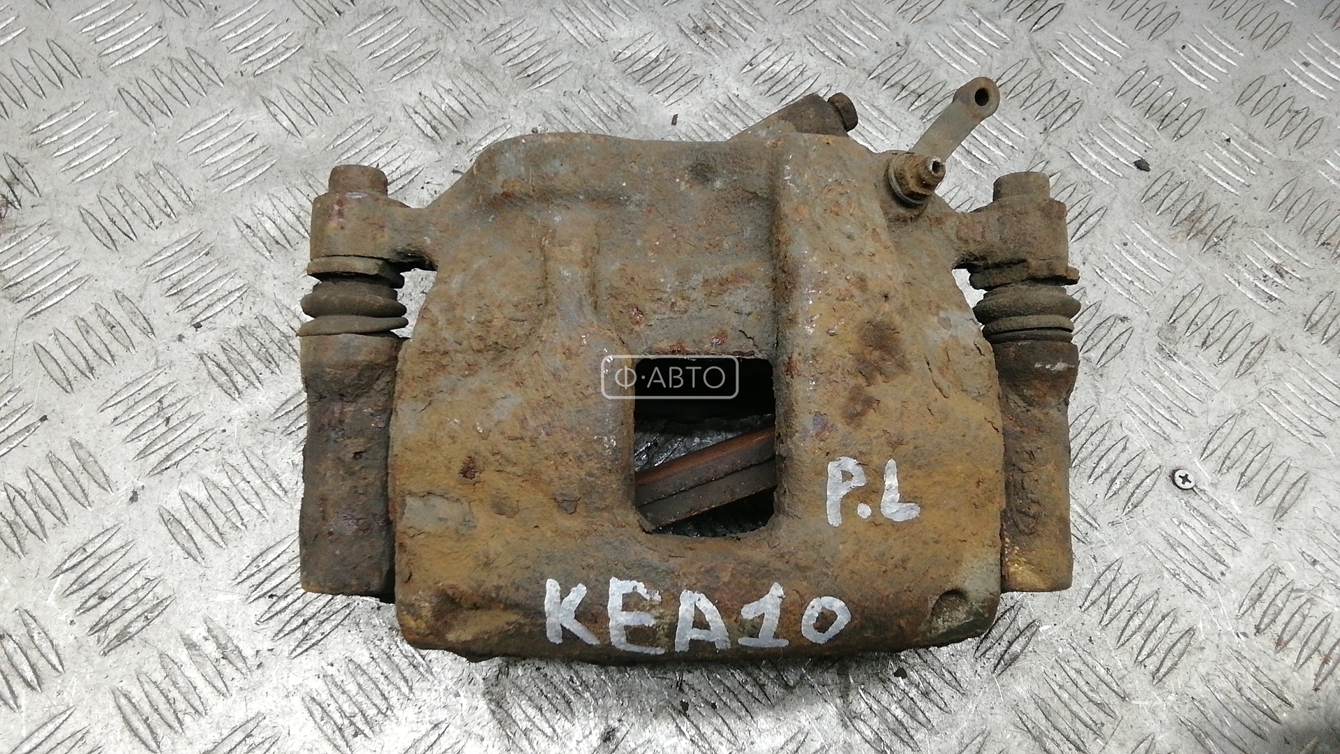 Суппорт тормозной передний левый