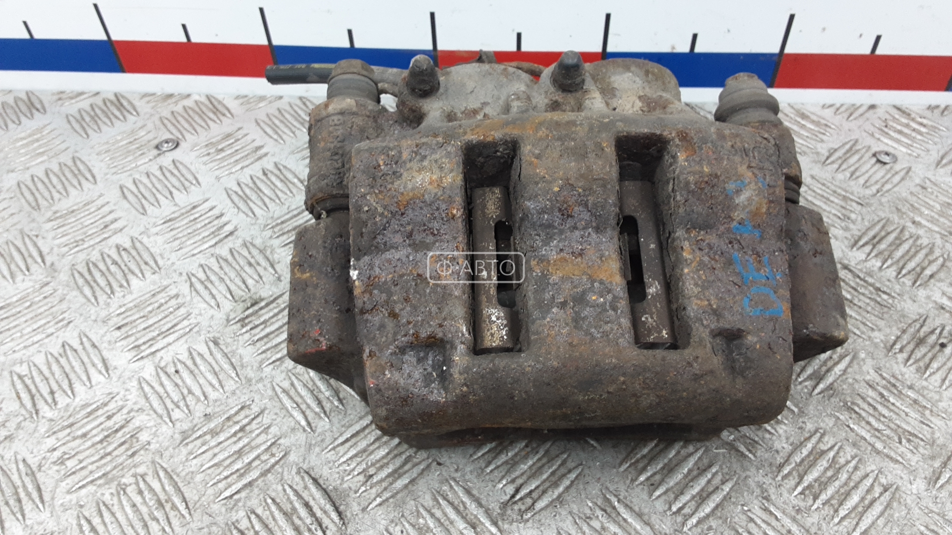 Суппорт тормозной передний левый