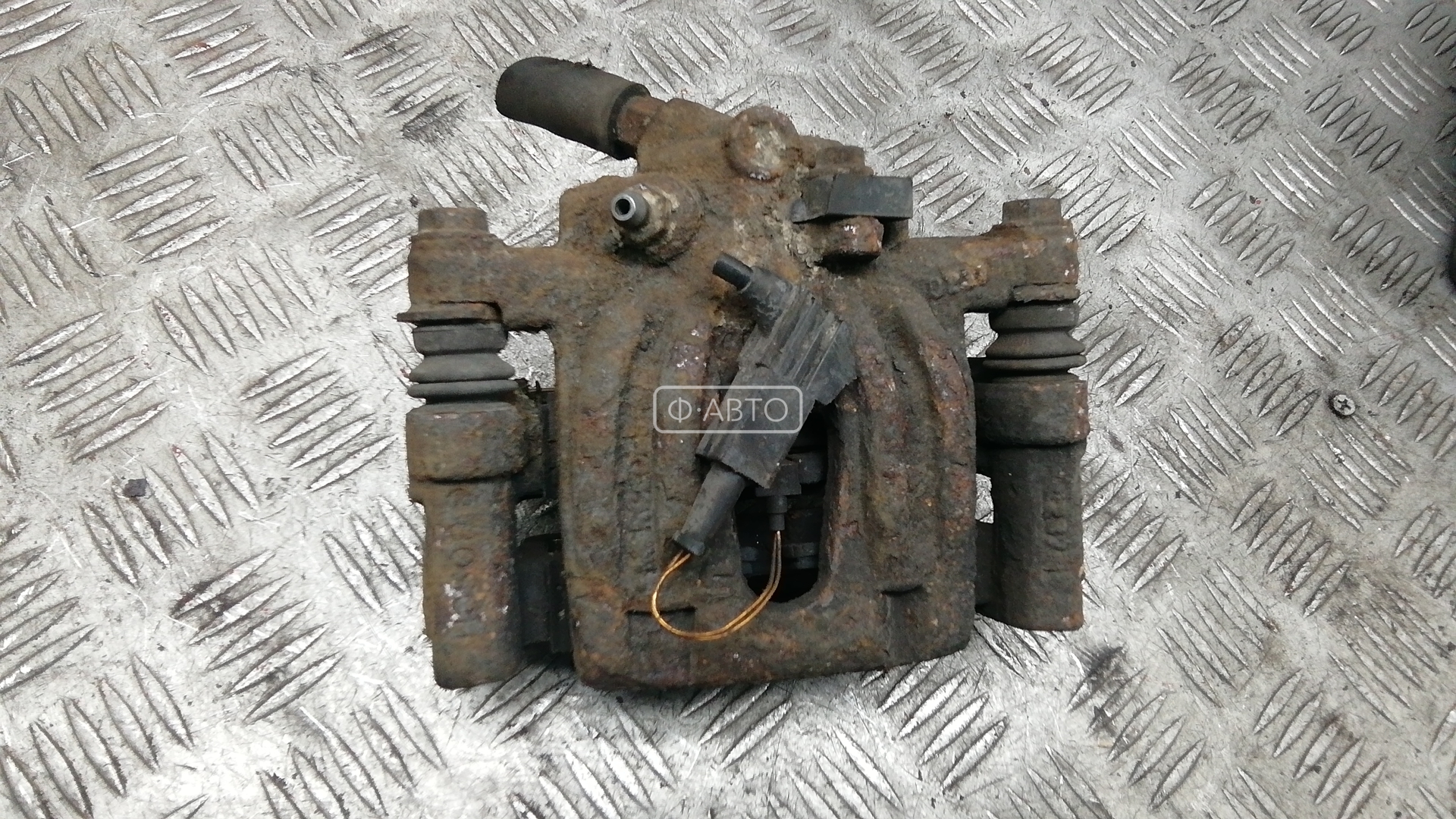 Суппорт тормозной задний левый