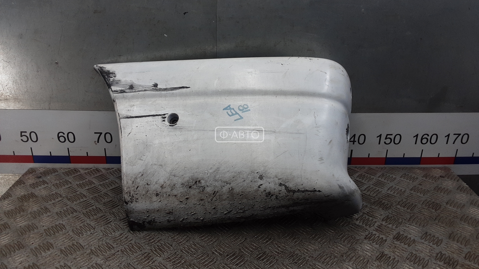 Клык бампера задний левый