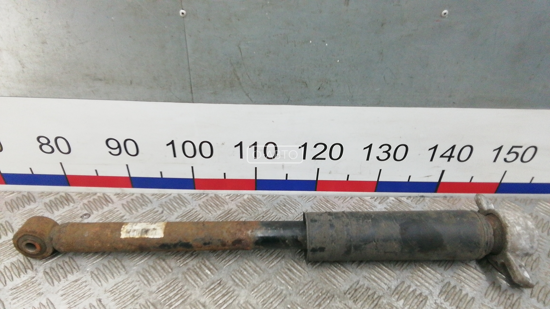 Амортизатор задней балки