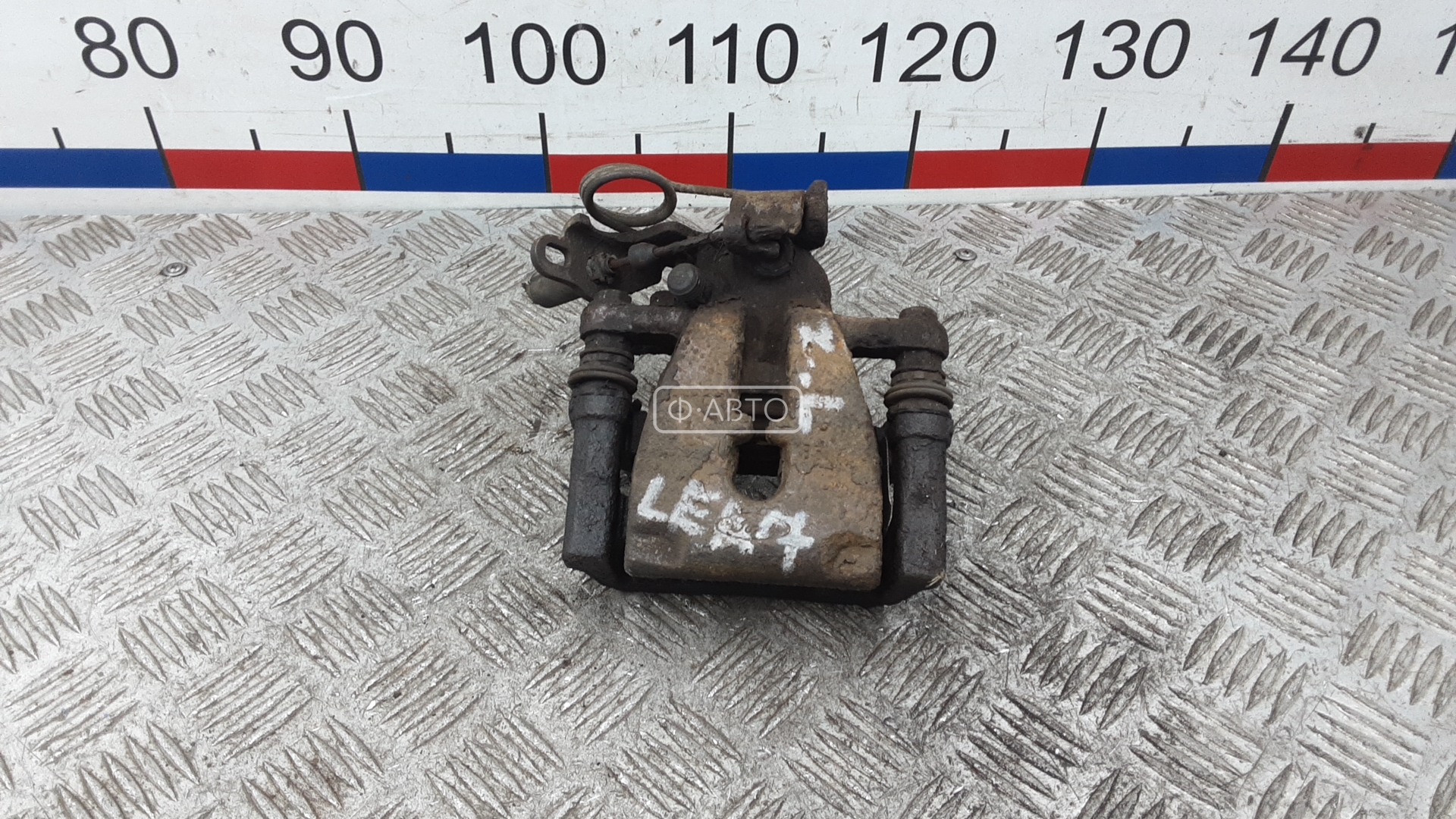 Суппорт тормозной задний левый