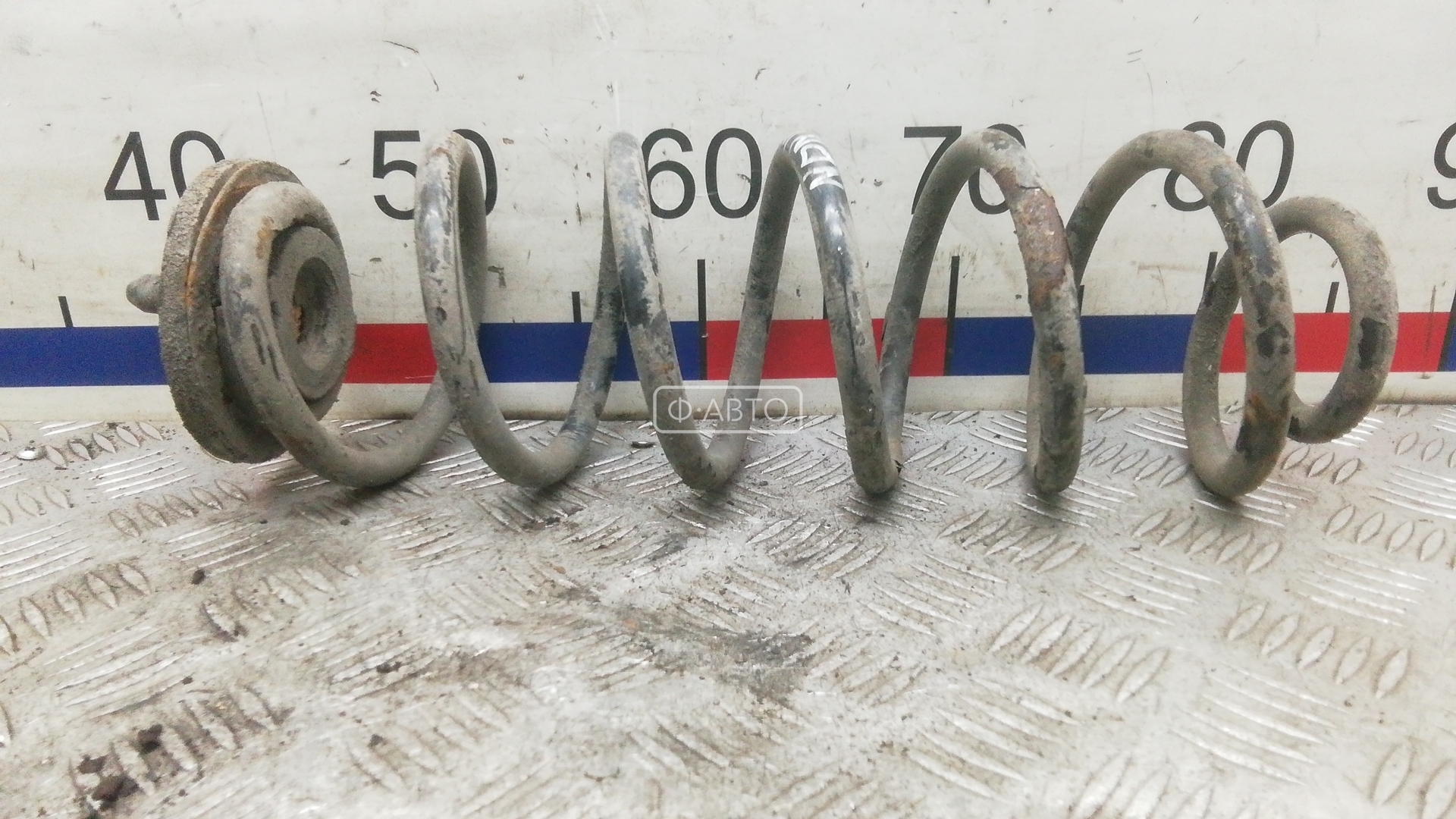 Пружина задняя