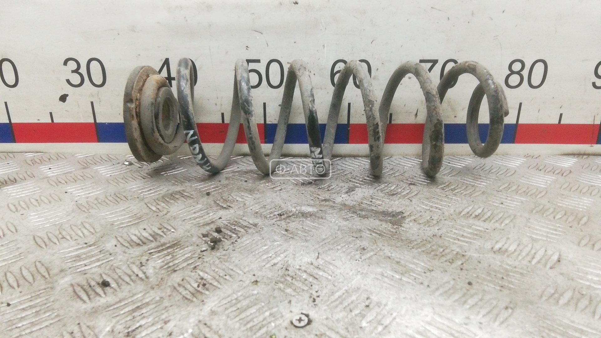 Пружина задняя