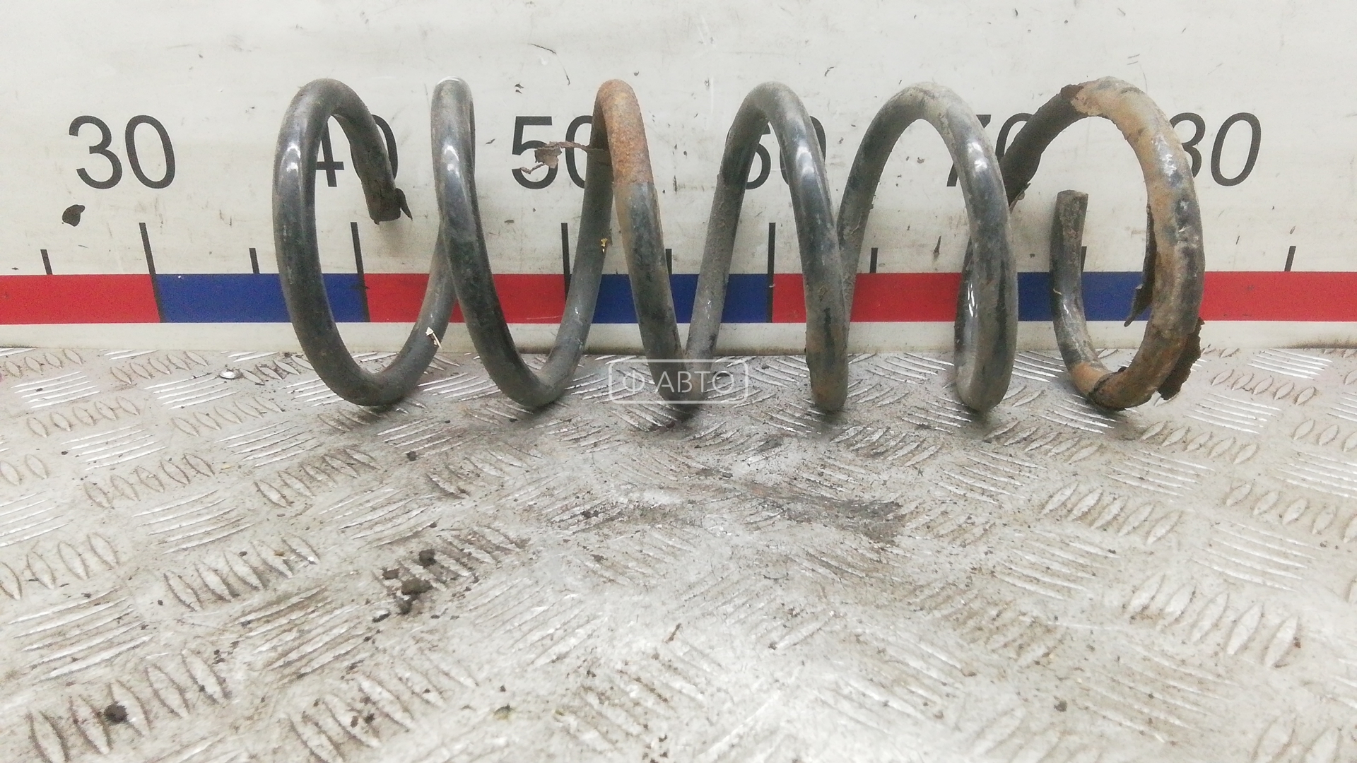 Пружина задняя