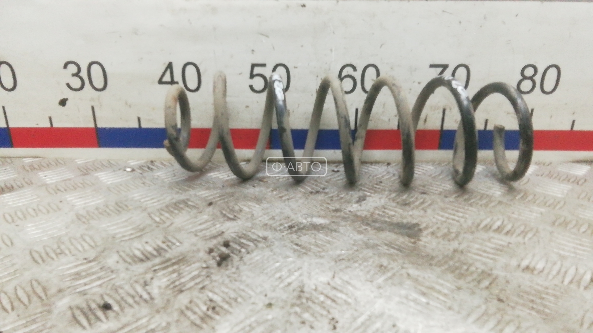 Пружина задняя