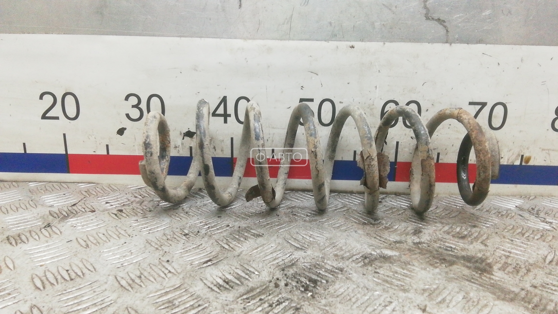 Пружина задняя