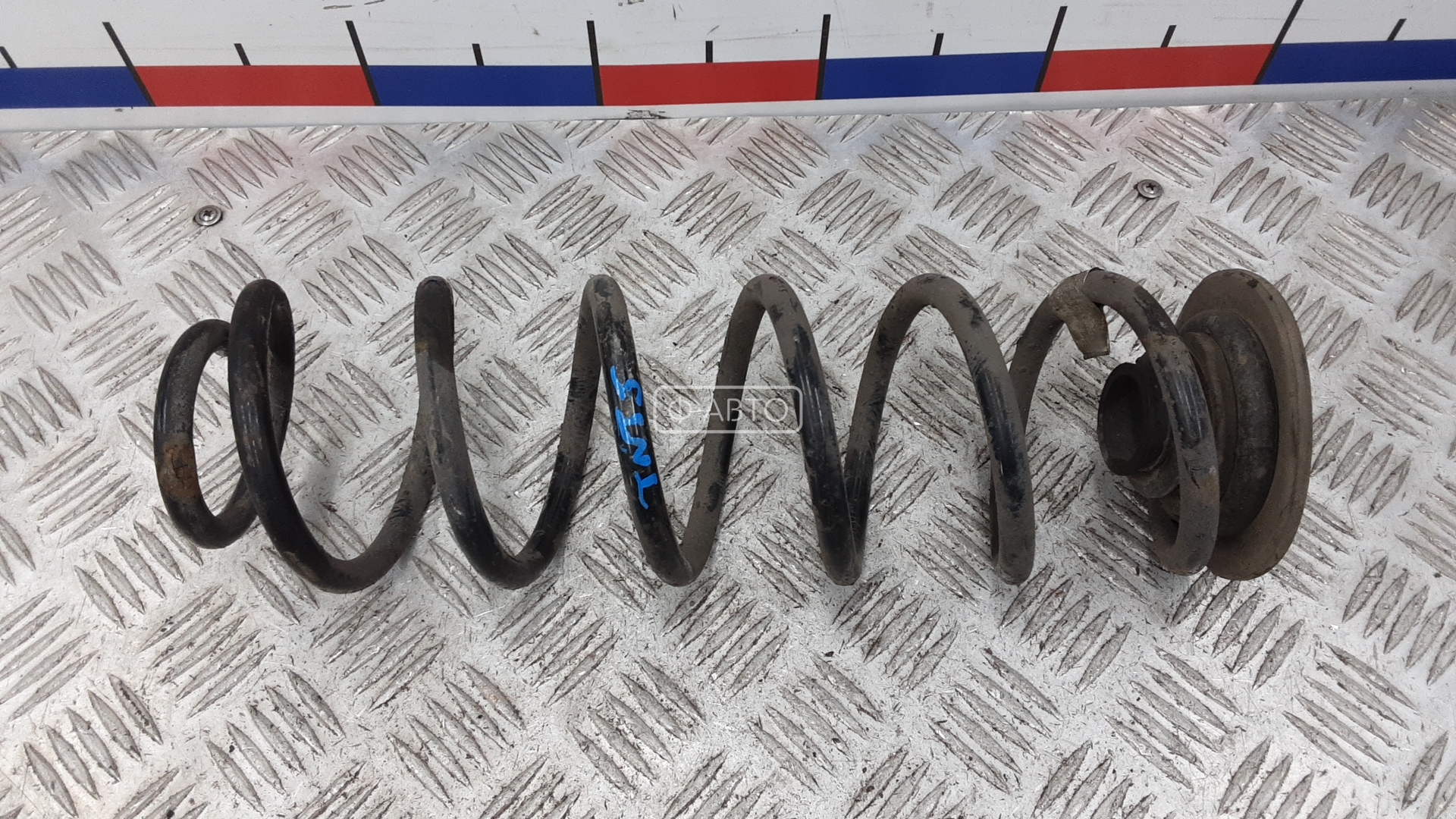 Пружина задняя