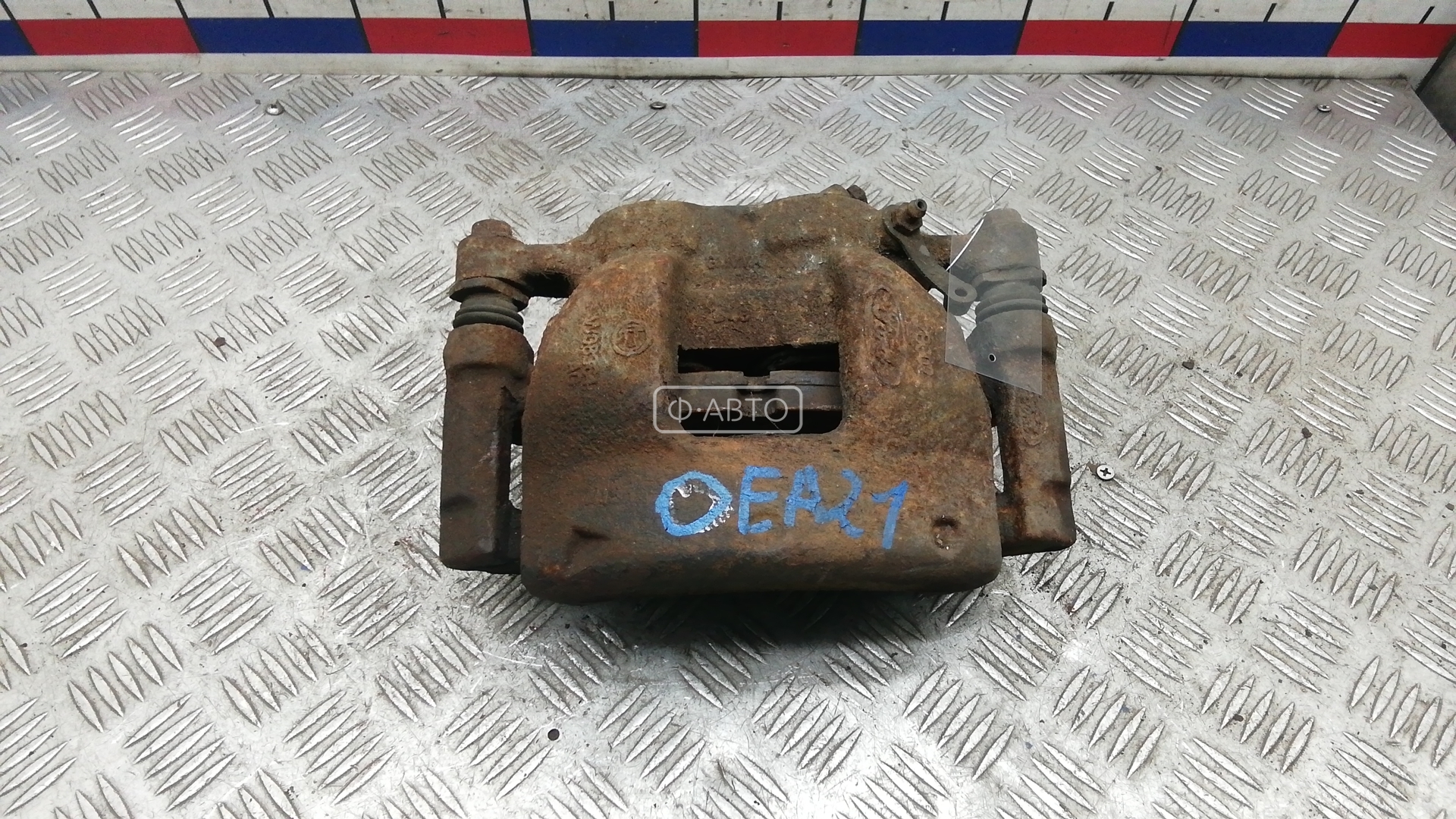 Суппорт тормозной передний левый