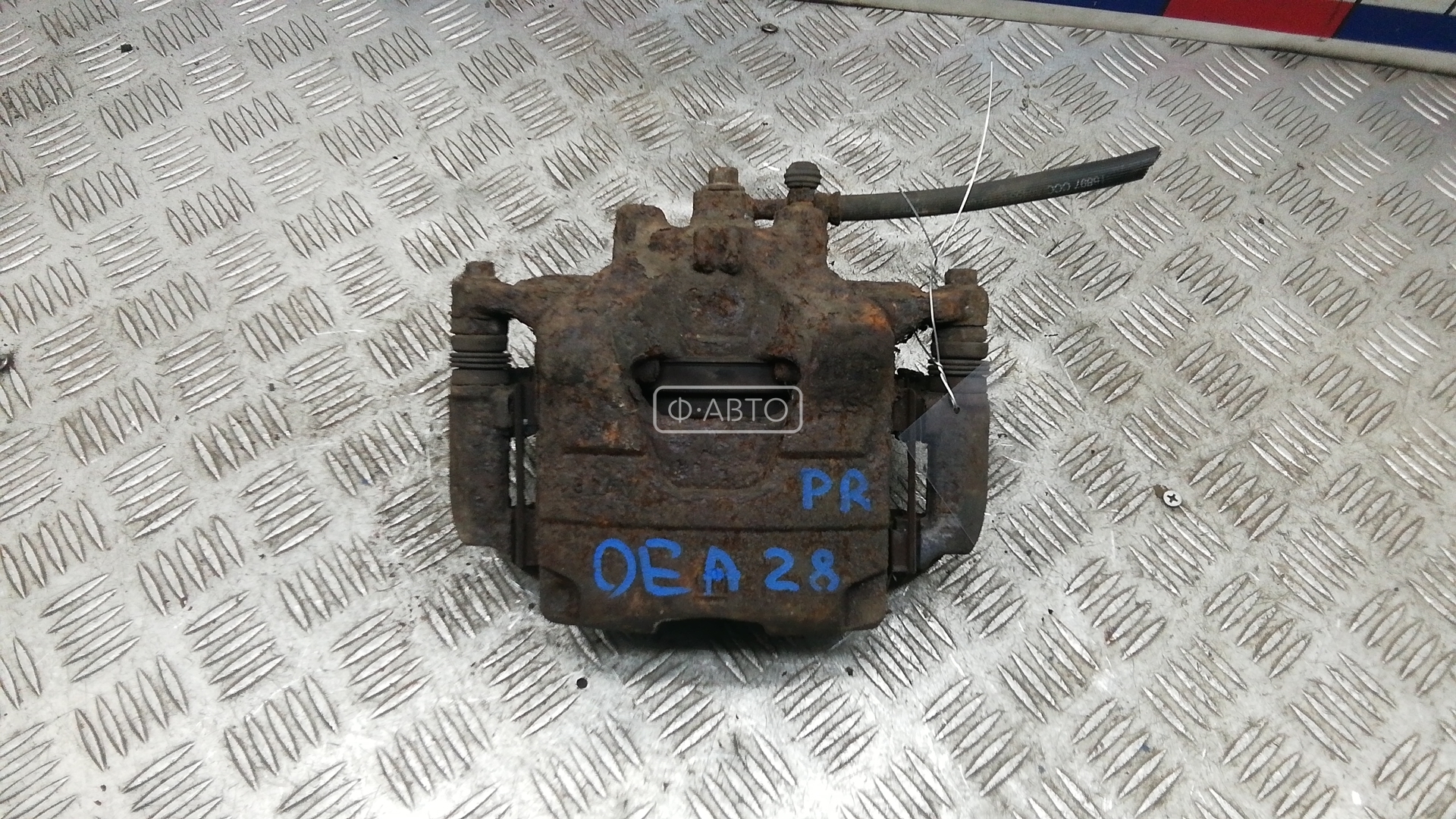 Суппорт тормозной передний левый