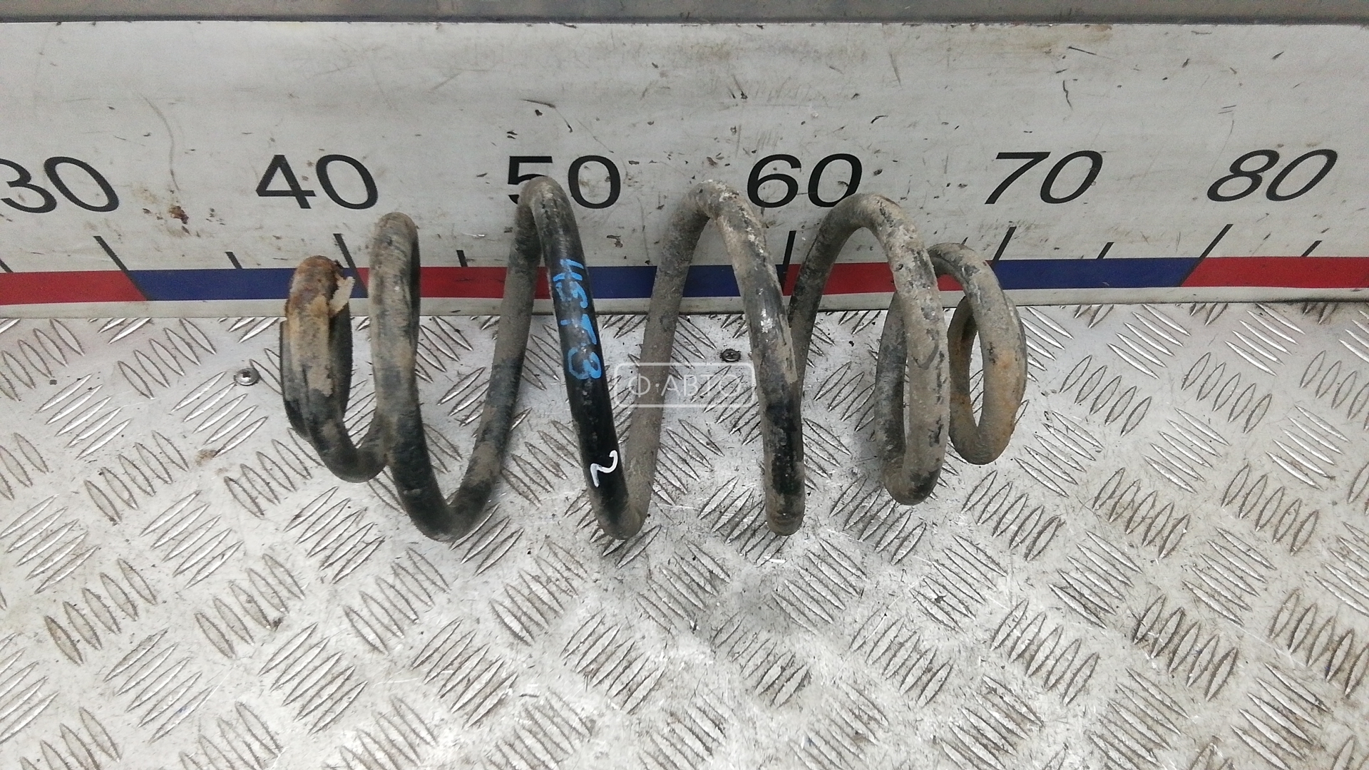 Пружина задняя