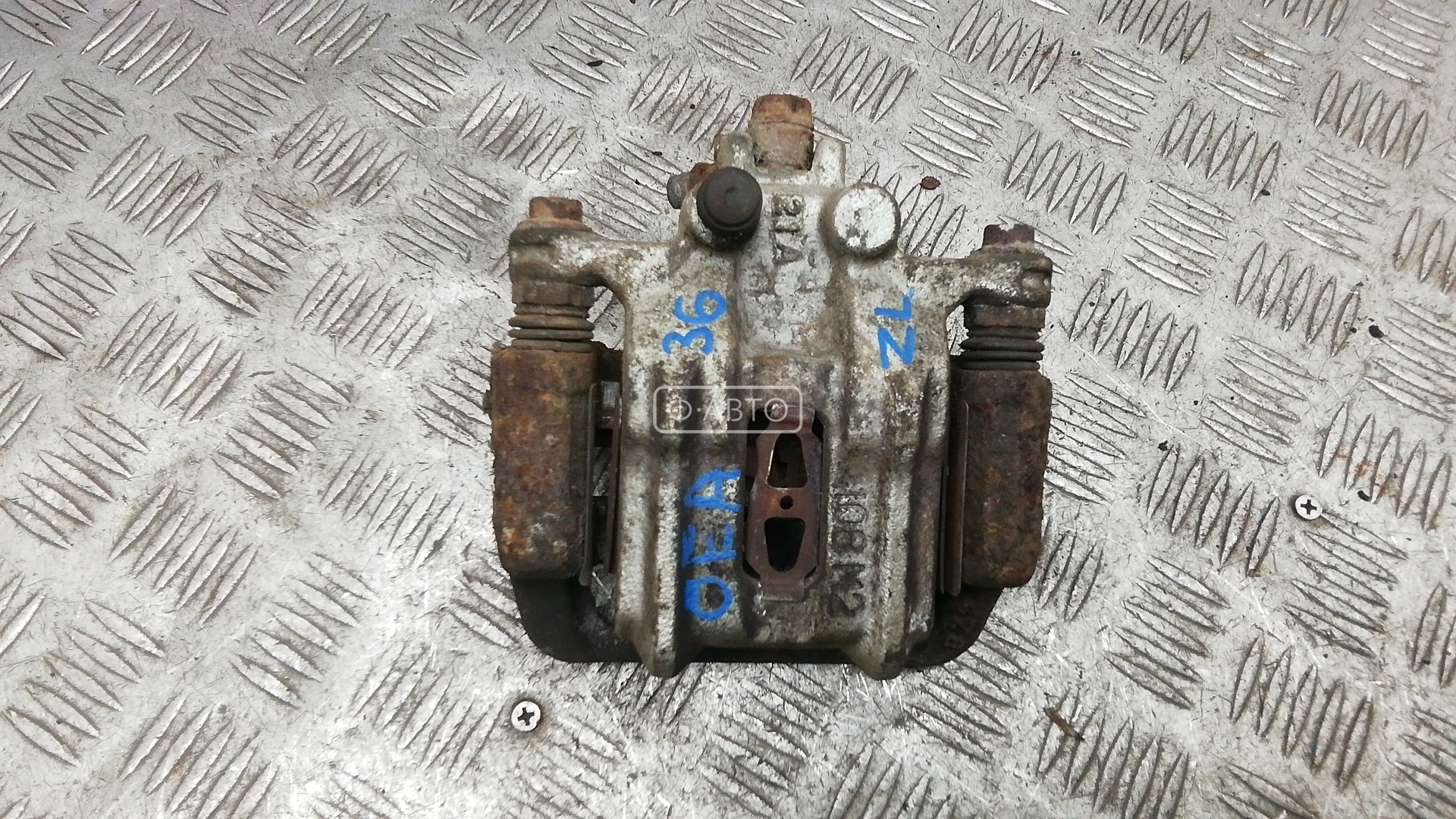 Суппорт тормозной задний левый