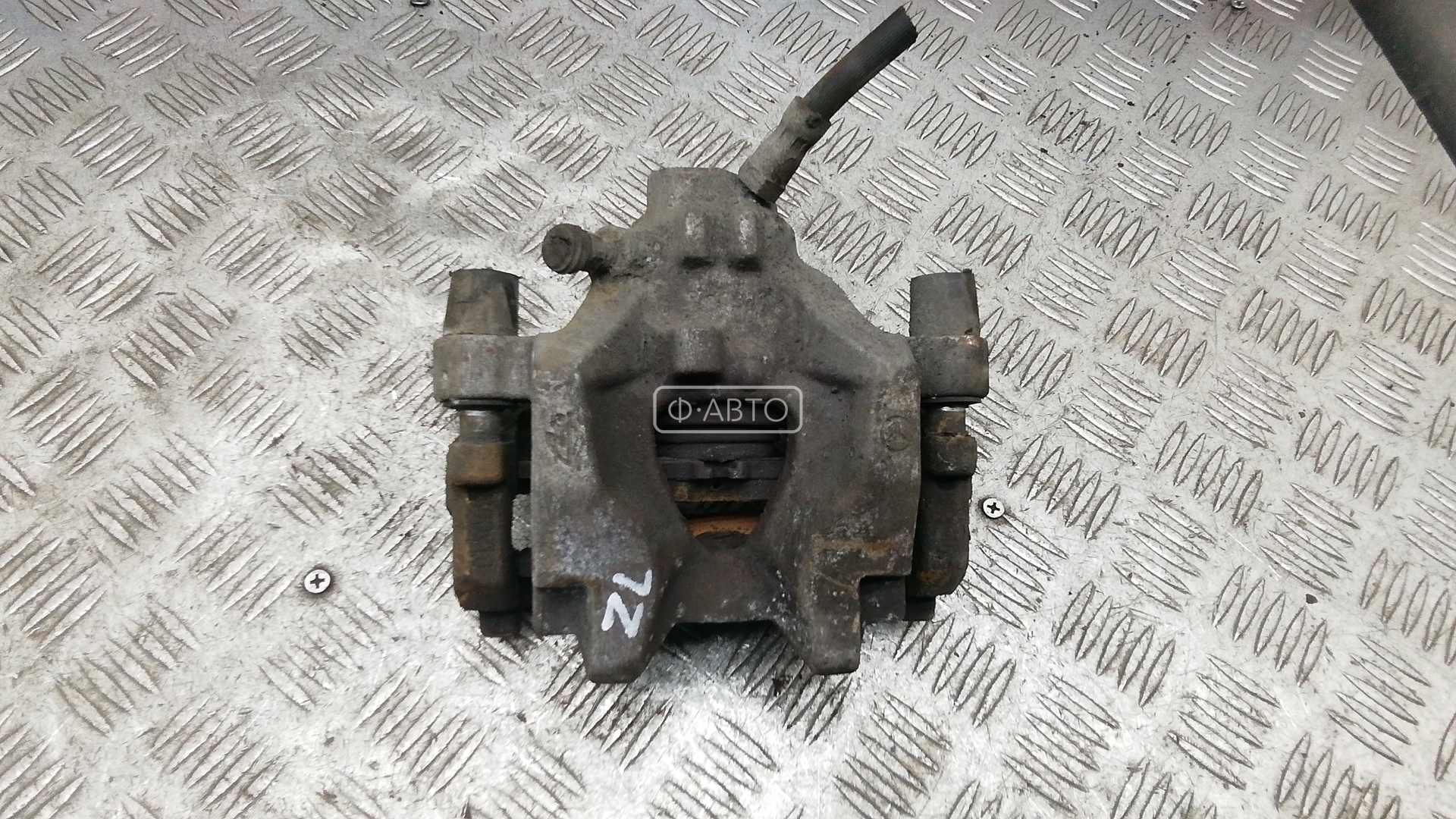 Суппорт тормозной задний левый