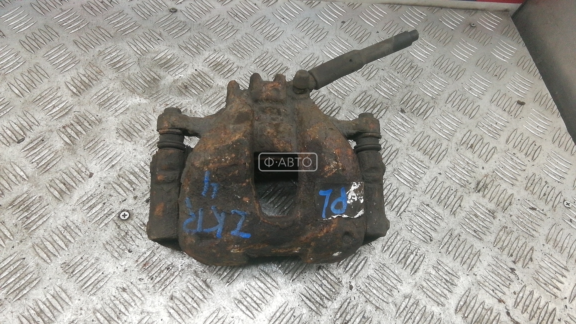 Суппорт тормозной передний левый