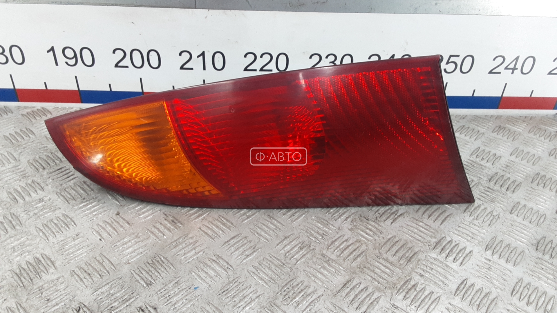 Фонарь задний левый