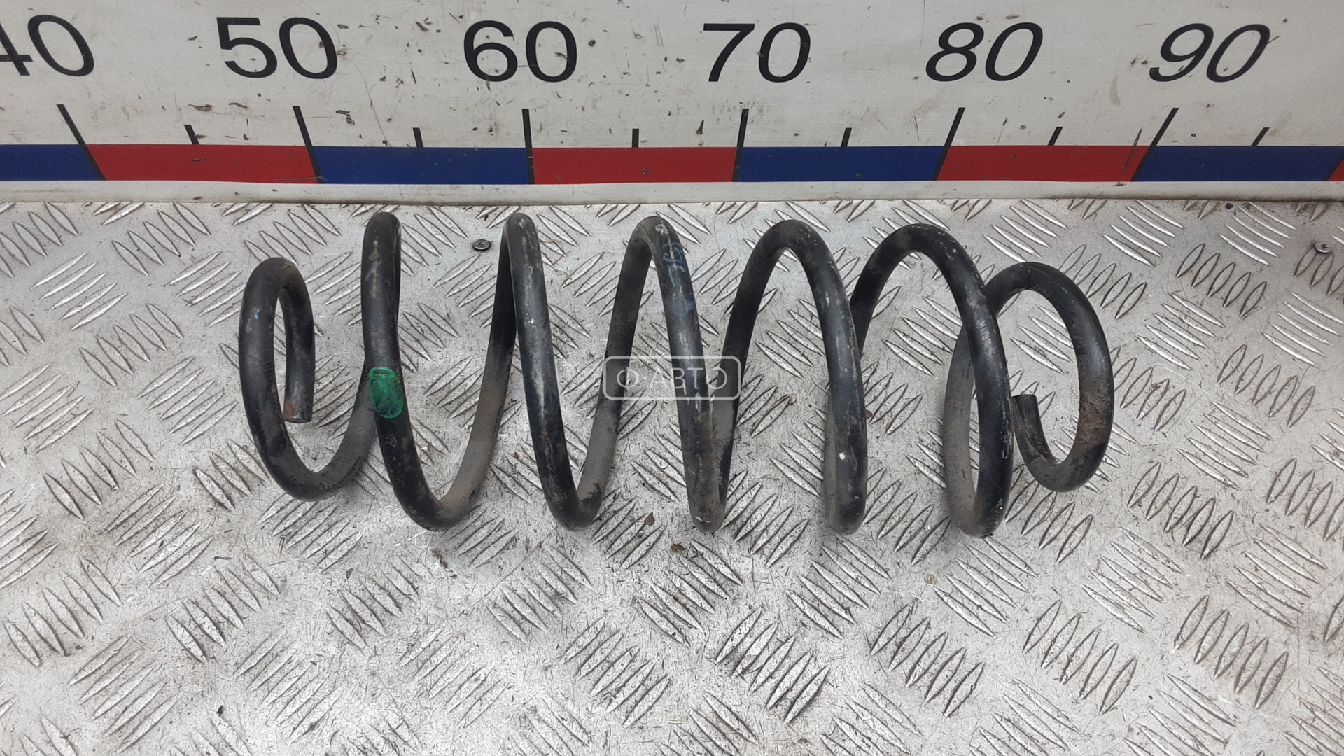Пружина задняя