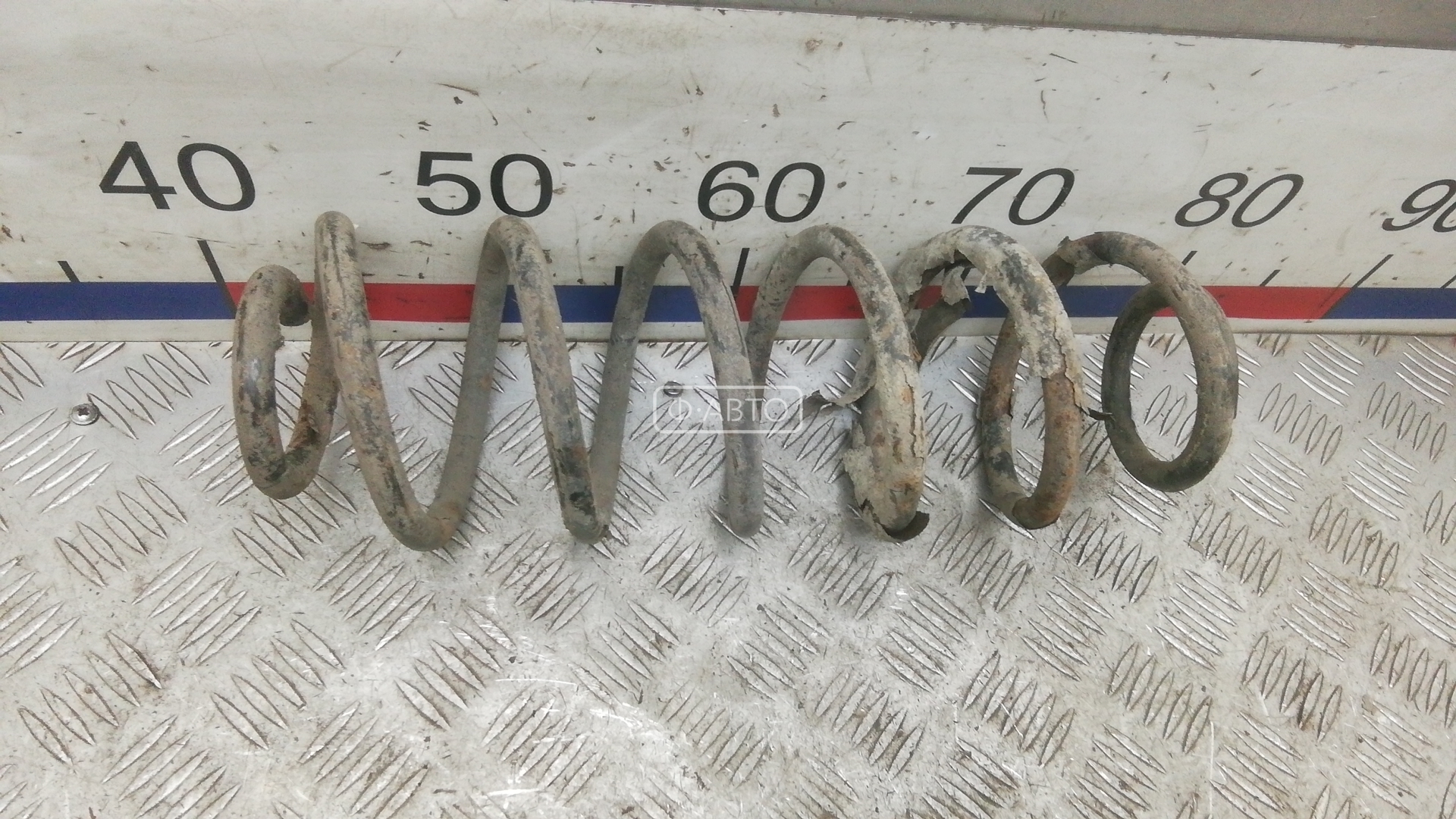 Пружина задняя