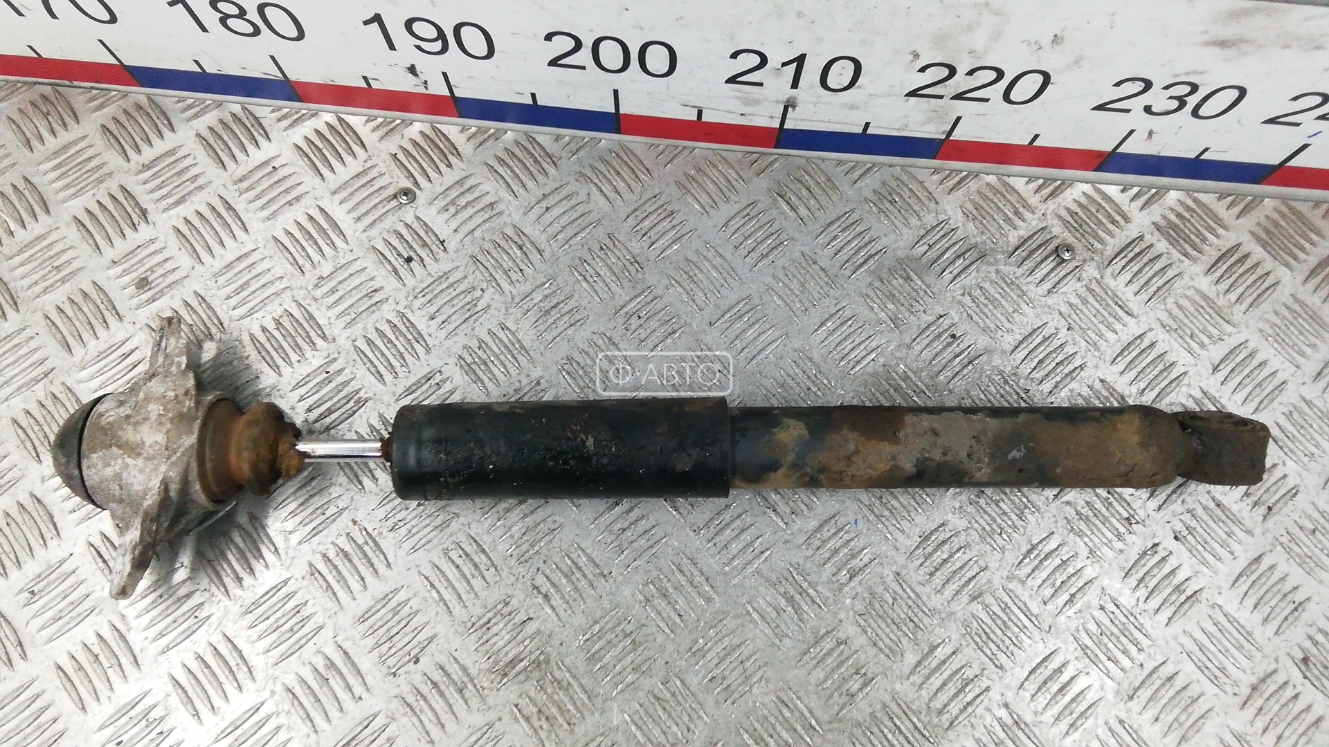 Амортизатор задней балки