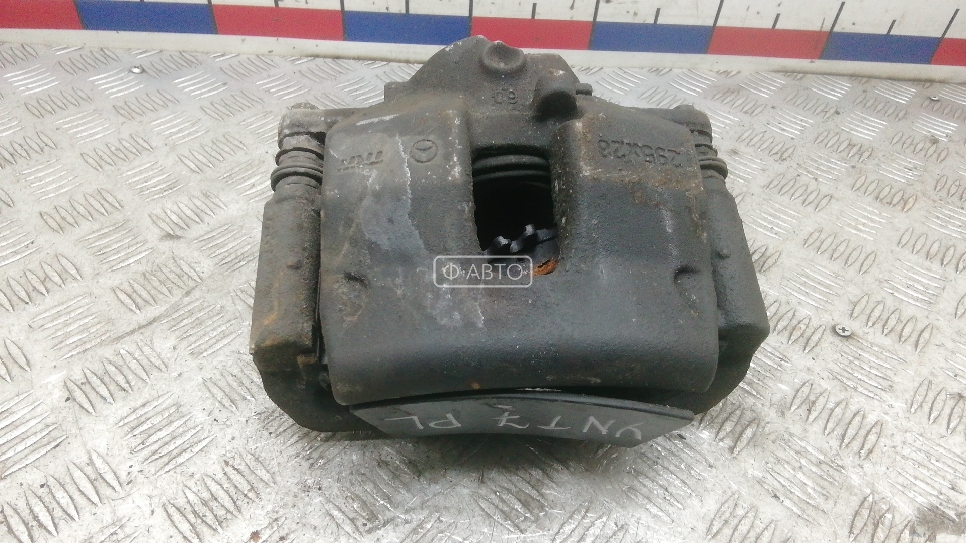 Суппорт тормозной передний левый