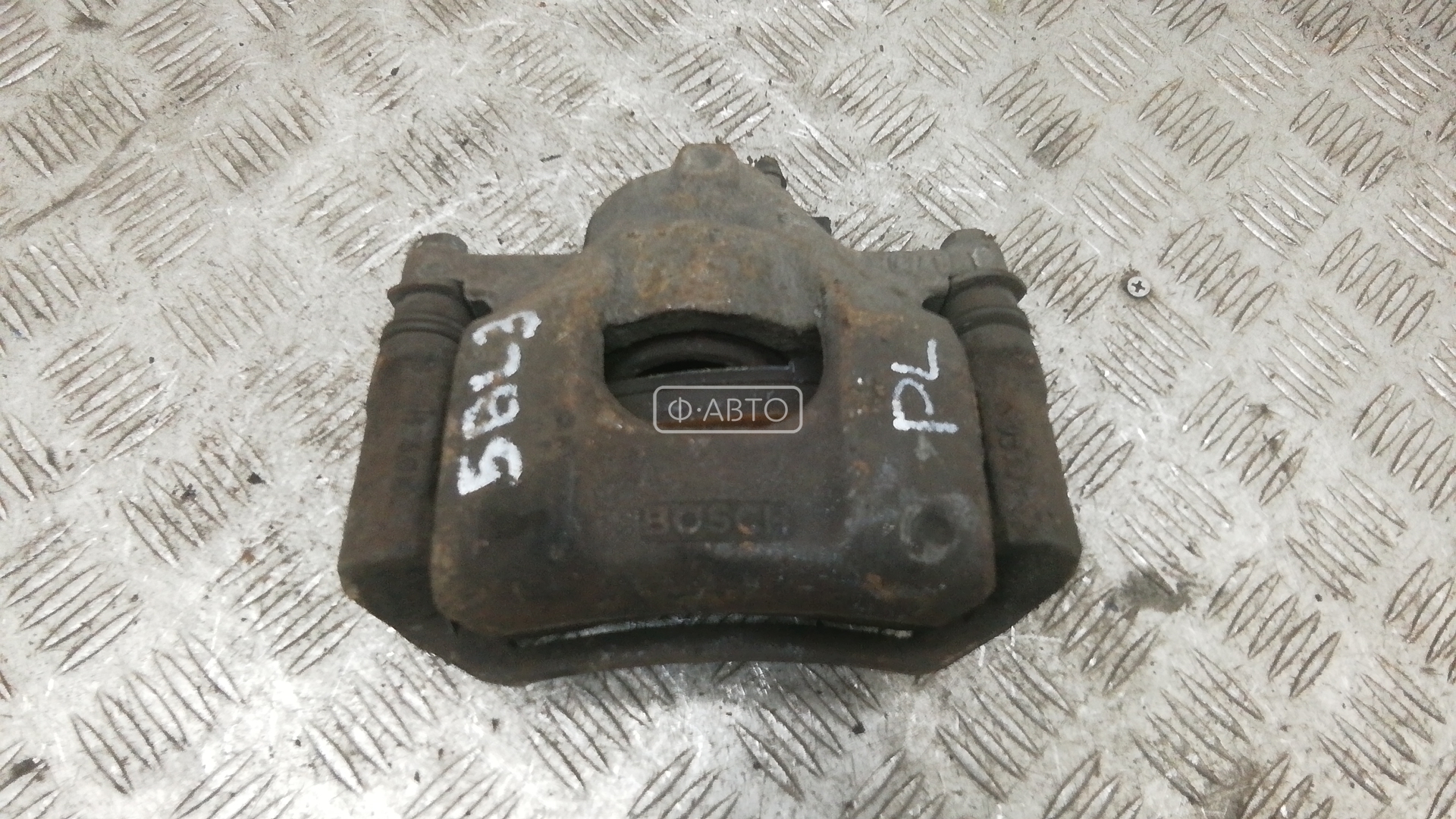 Суппорт тормозной передний левый