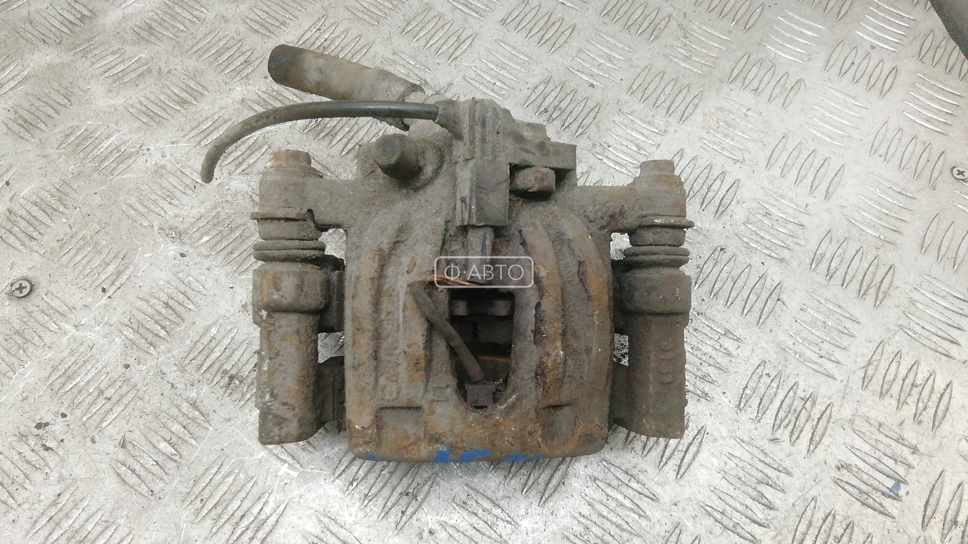 Суппорт тормозной задний левый