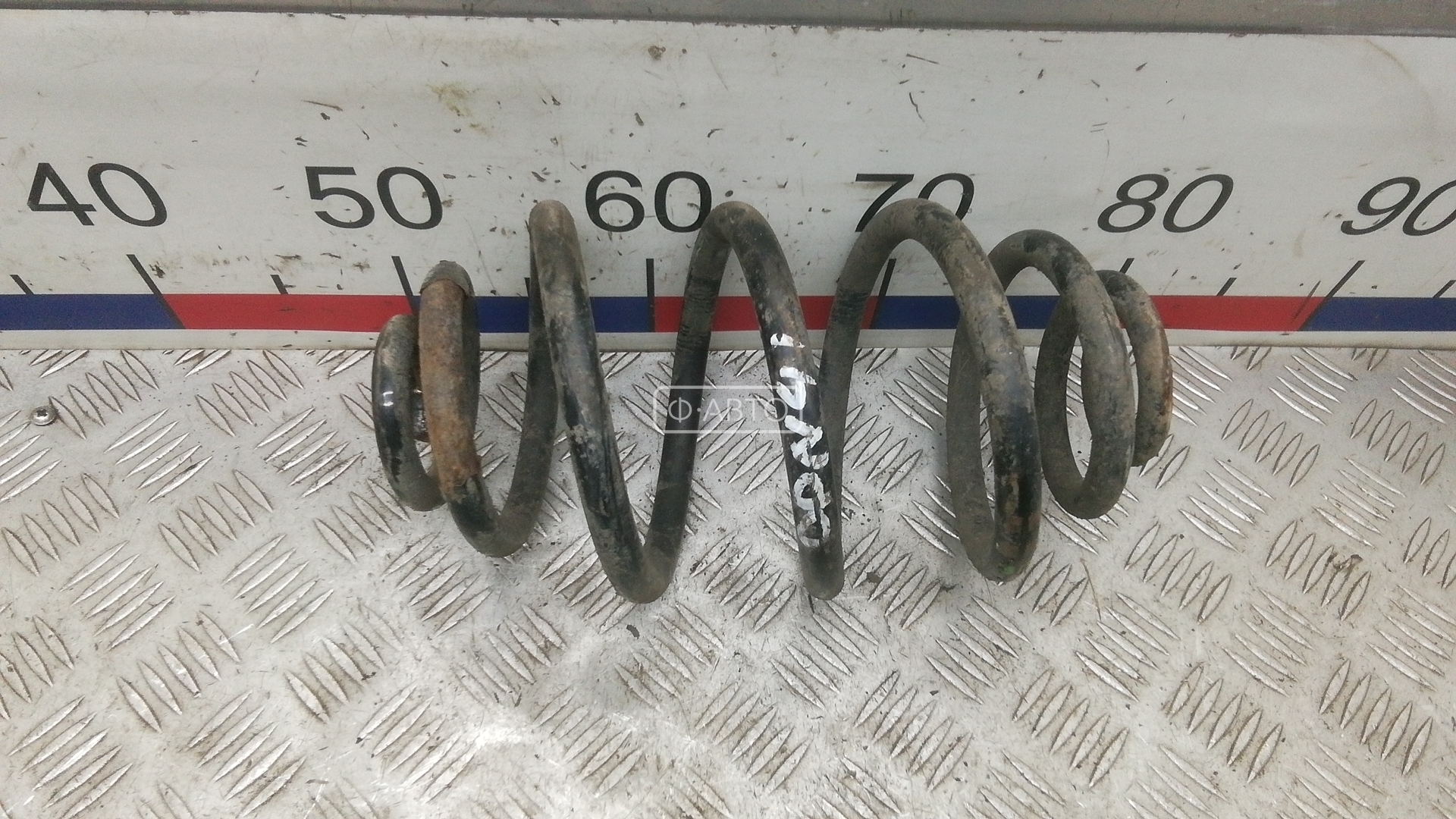 Пружина задняя