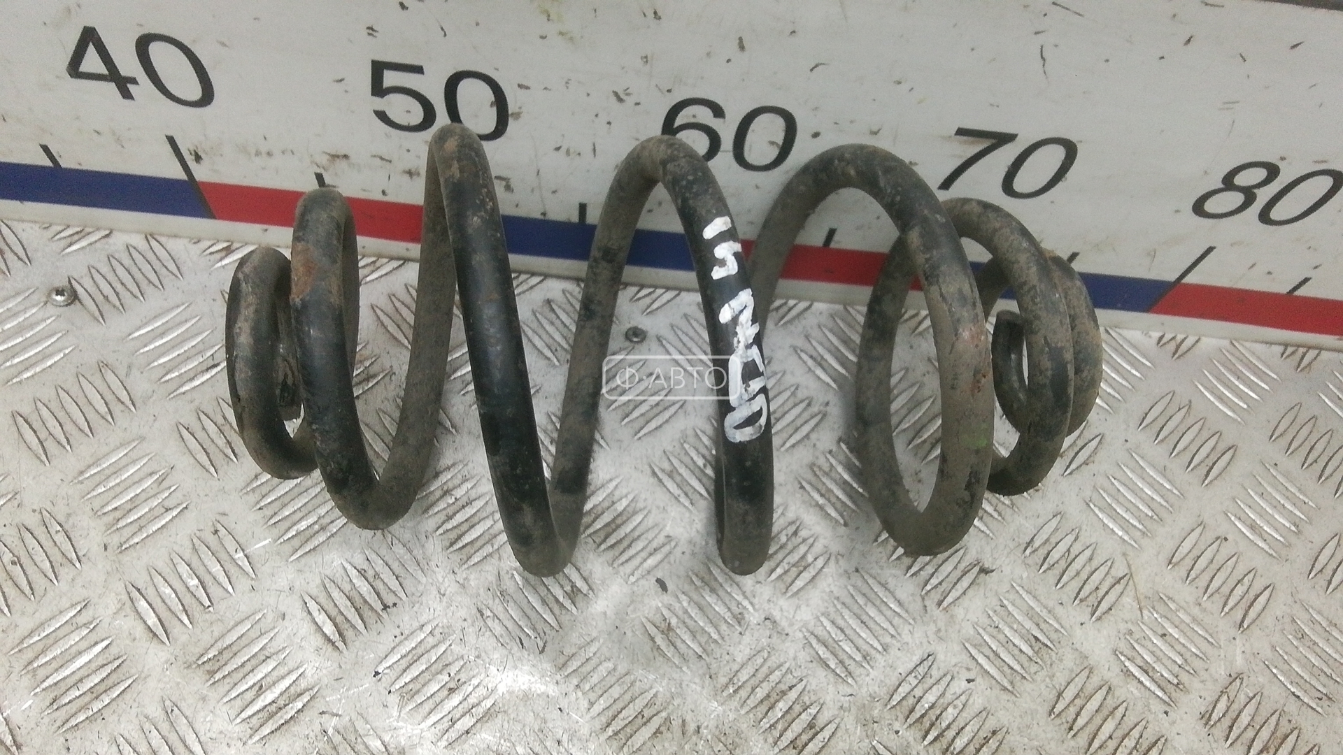 Пружина задняя