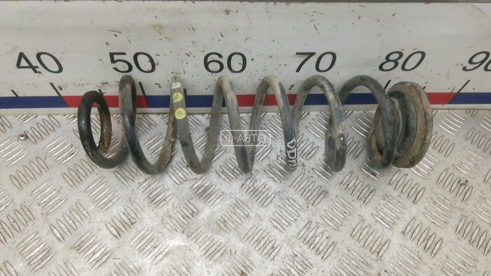 Пружина задняя