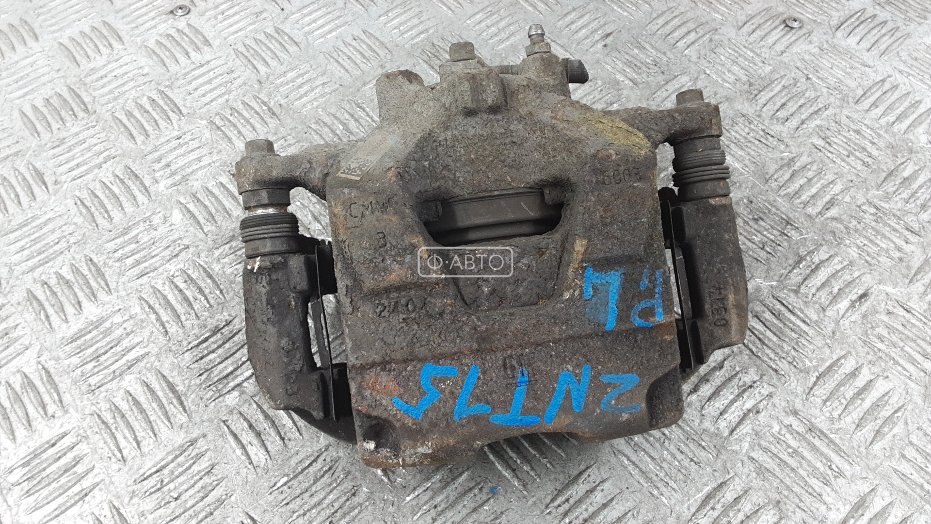 Суппорт тормозной передний левый