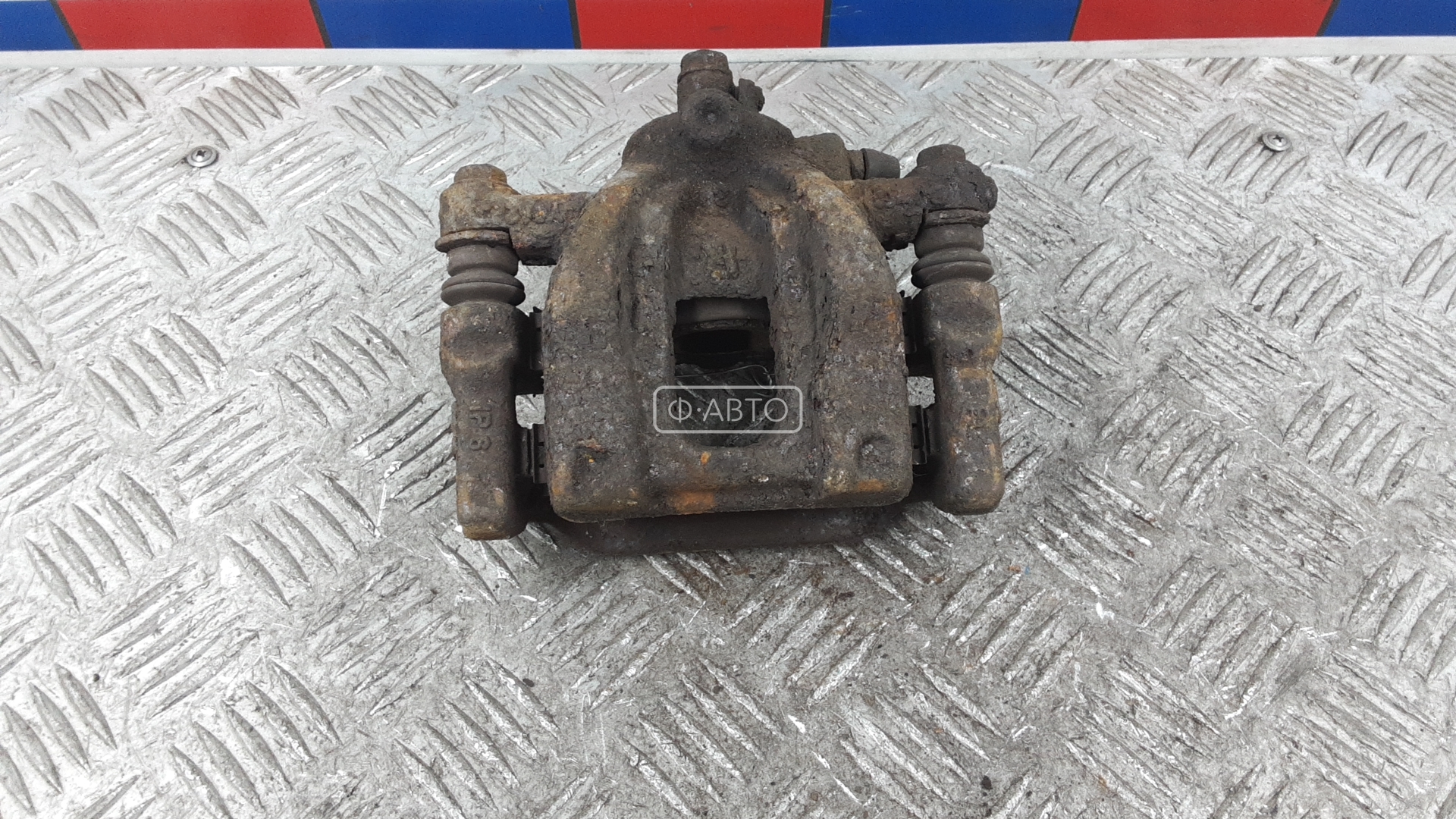 Суппорт тормозной задний правый