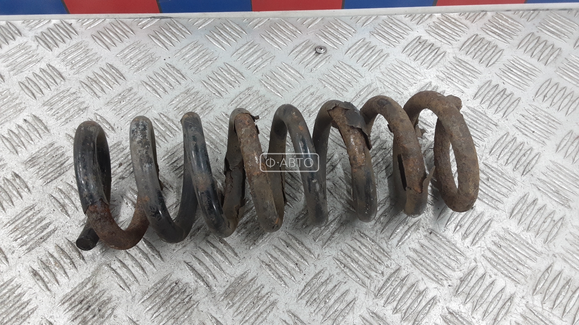 Пружина задняя