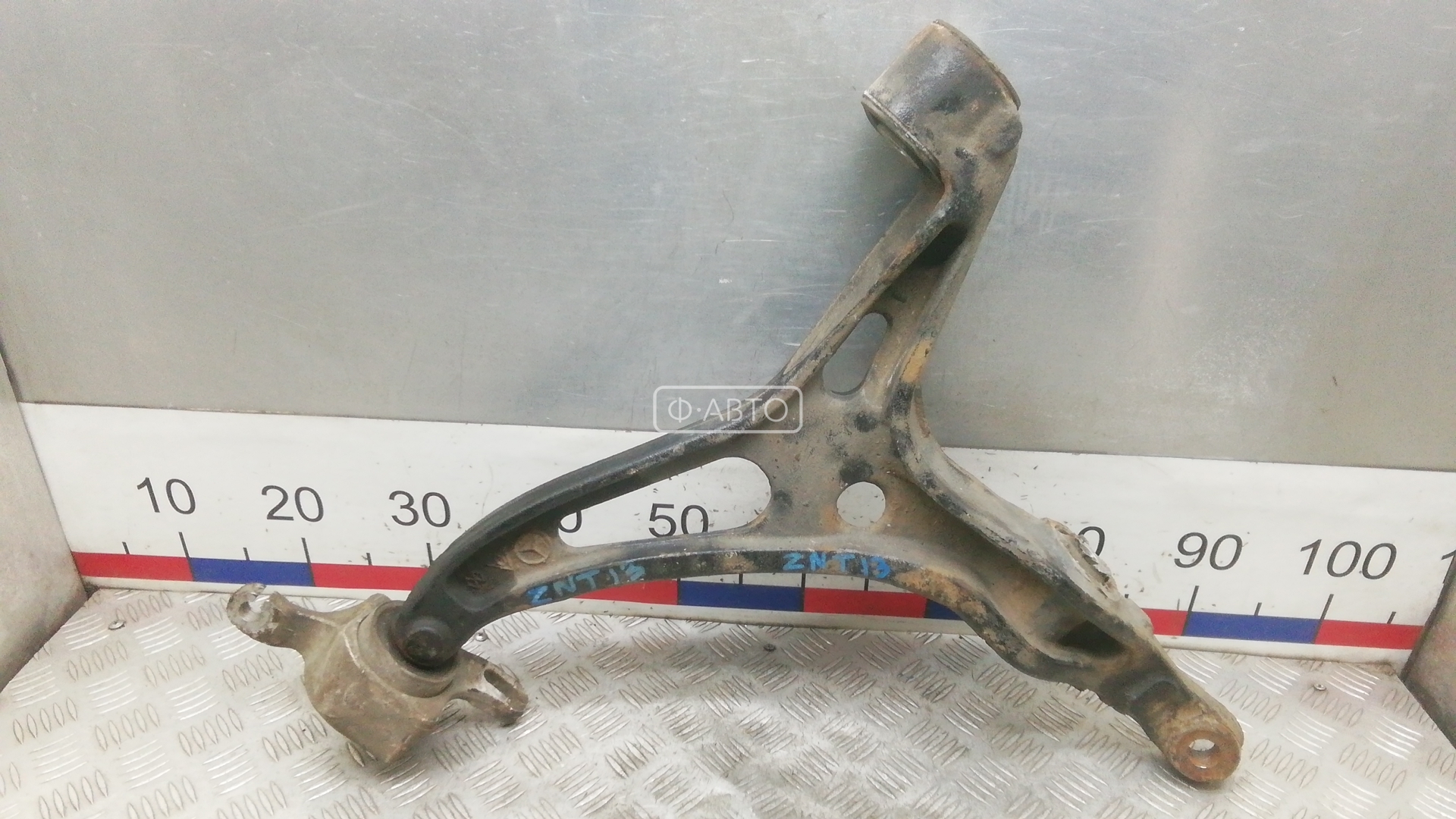 Рычаг передний нижний левый