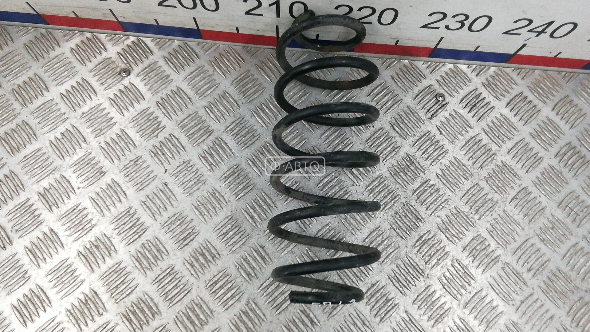 Пружина задняя