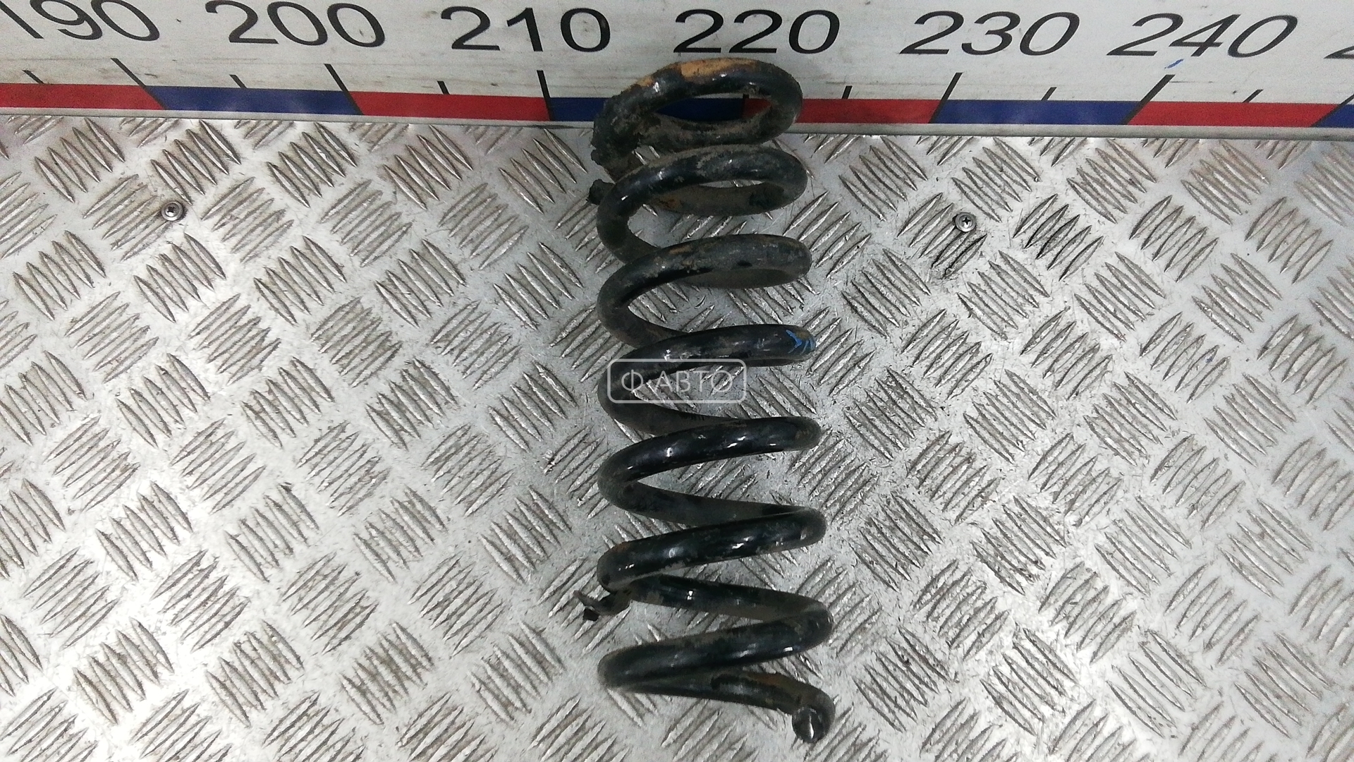 Пружина задняя