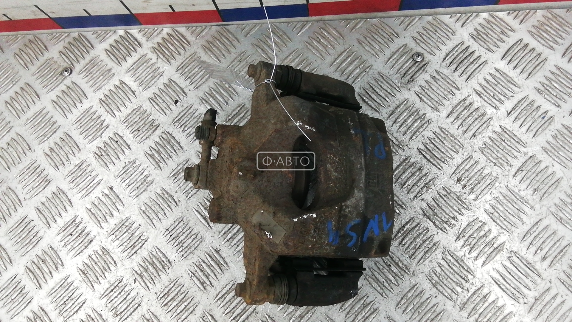 Суппорт тормозной передний левый