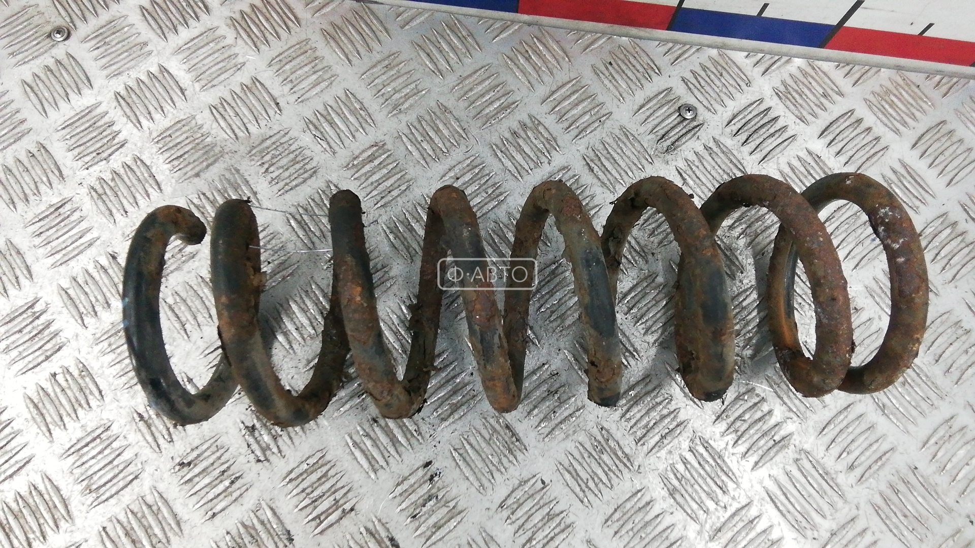 Пружина задняя