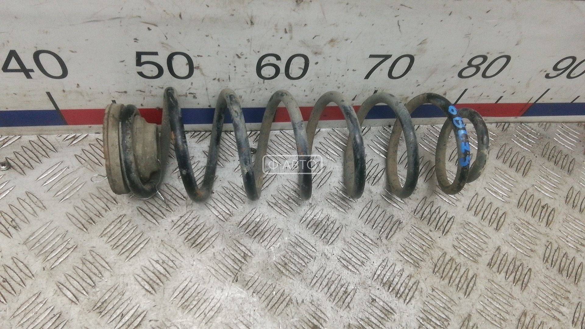 Пружина задняя