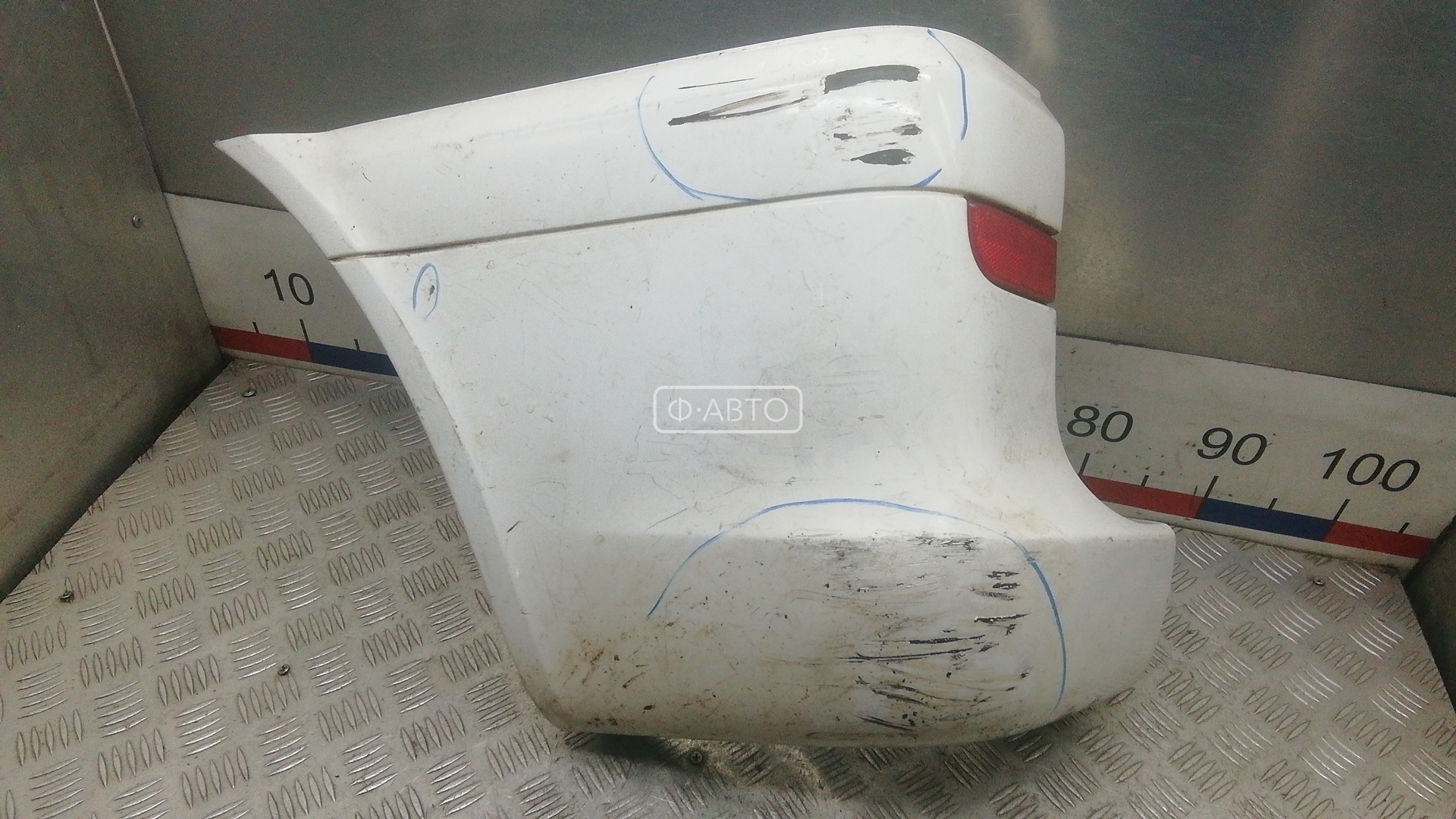 Клык бампера задний левый