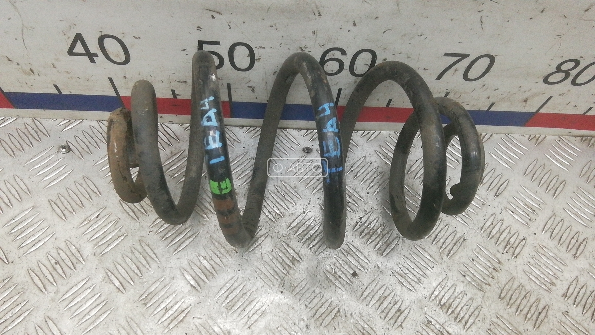 Пружина задняя