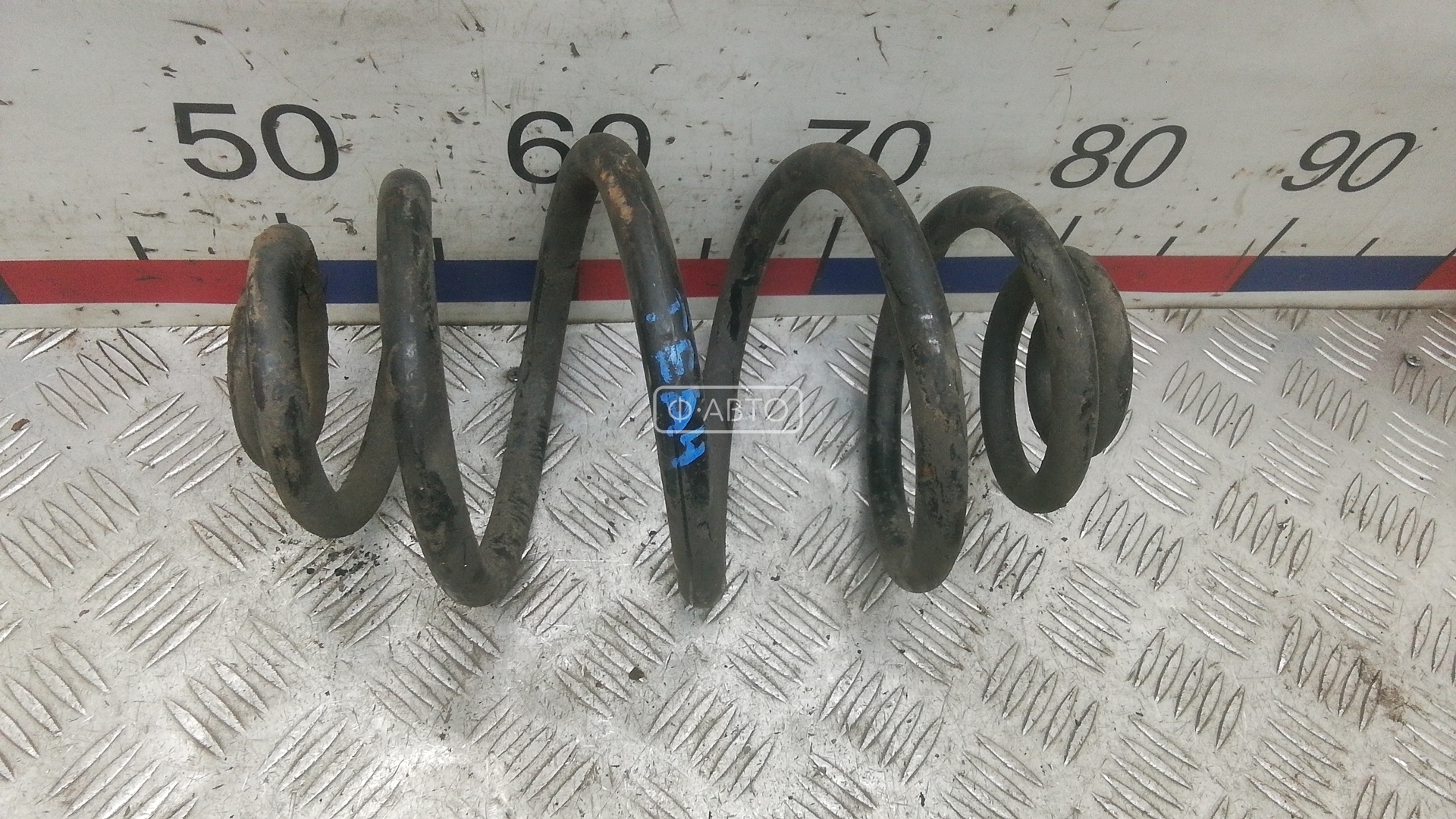 Пружина задняя