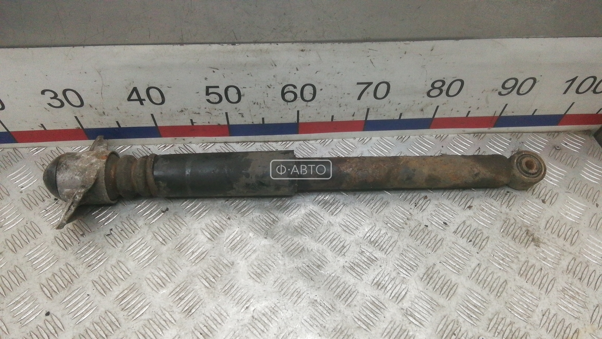 Амортизатор задней балки