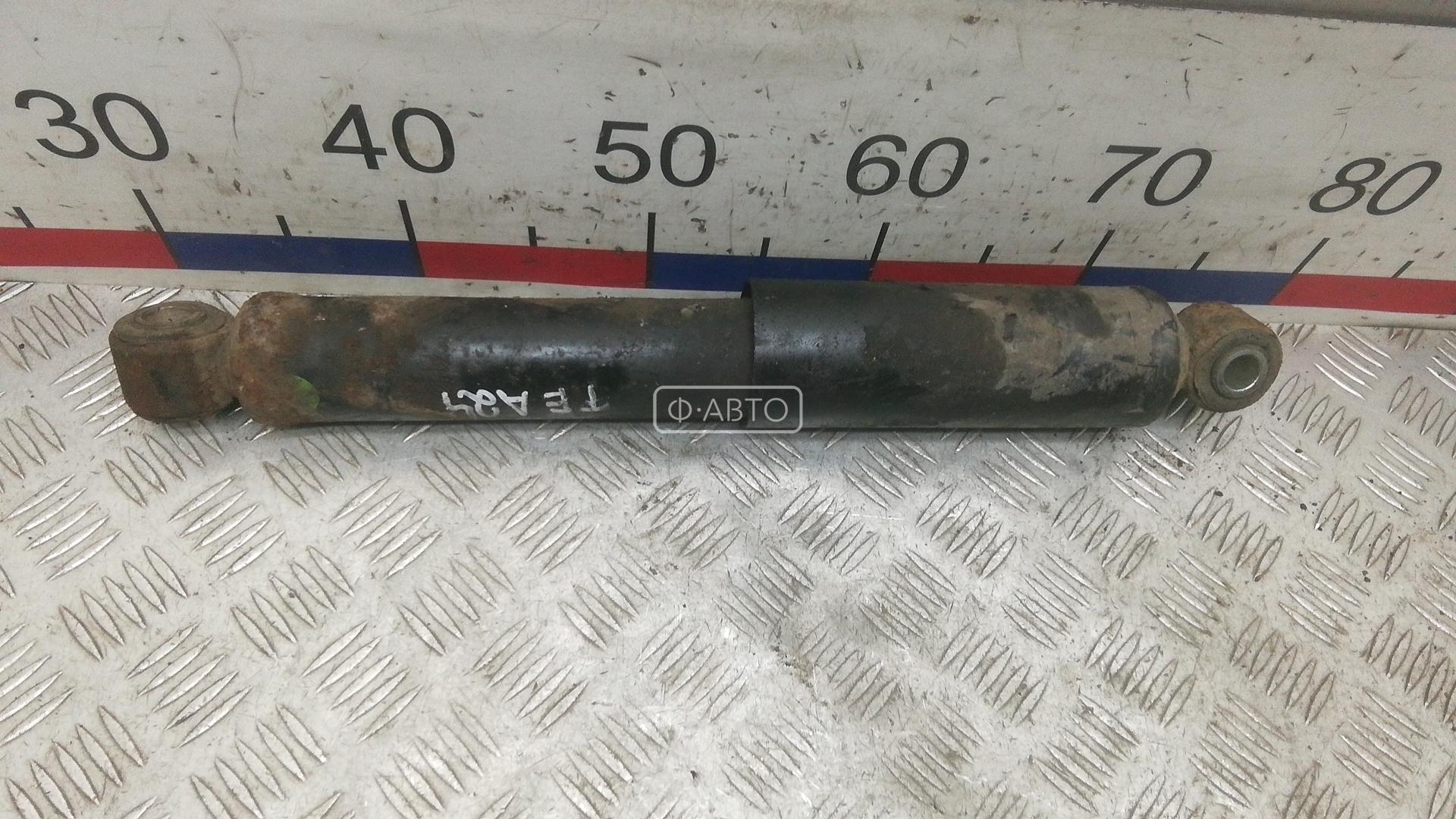 Амортизатор задней балки