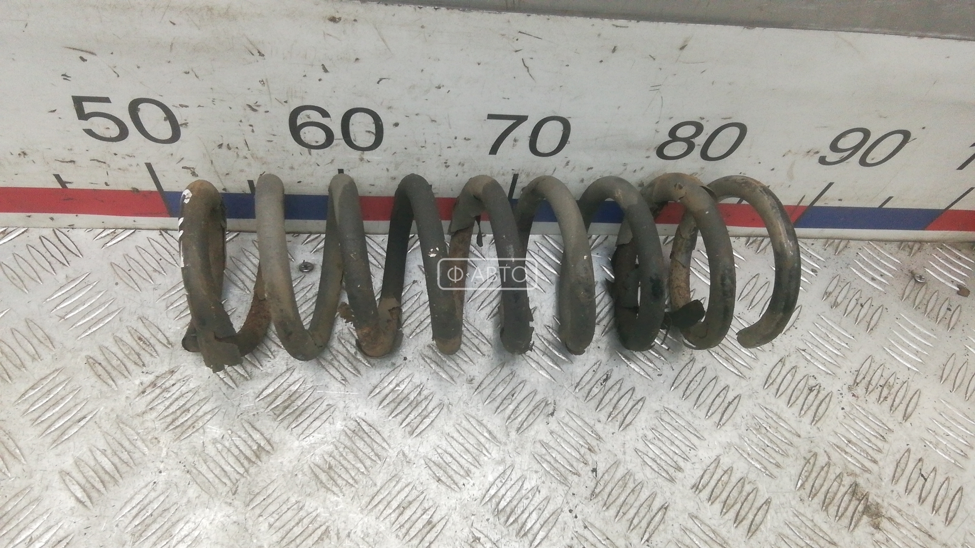 Пружина задняя