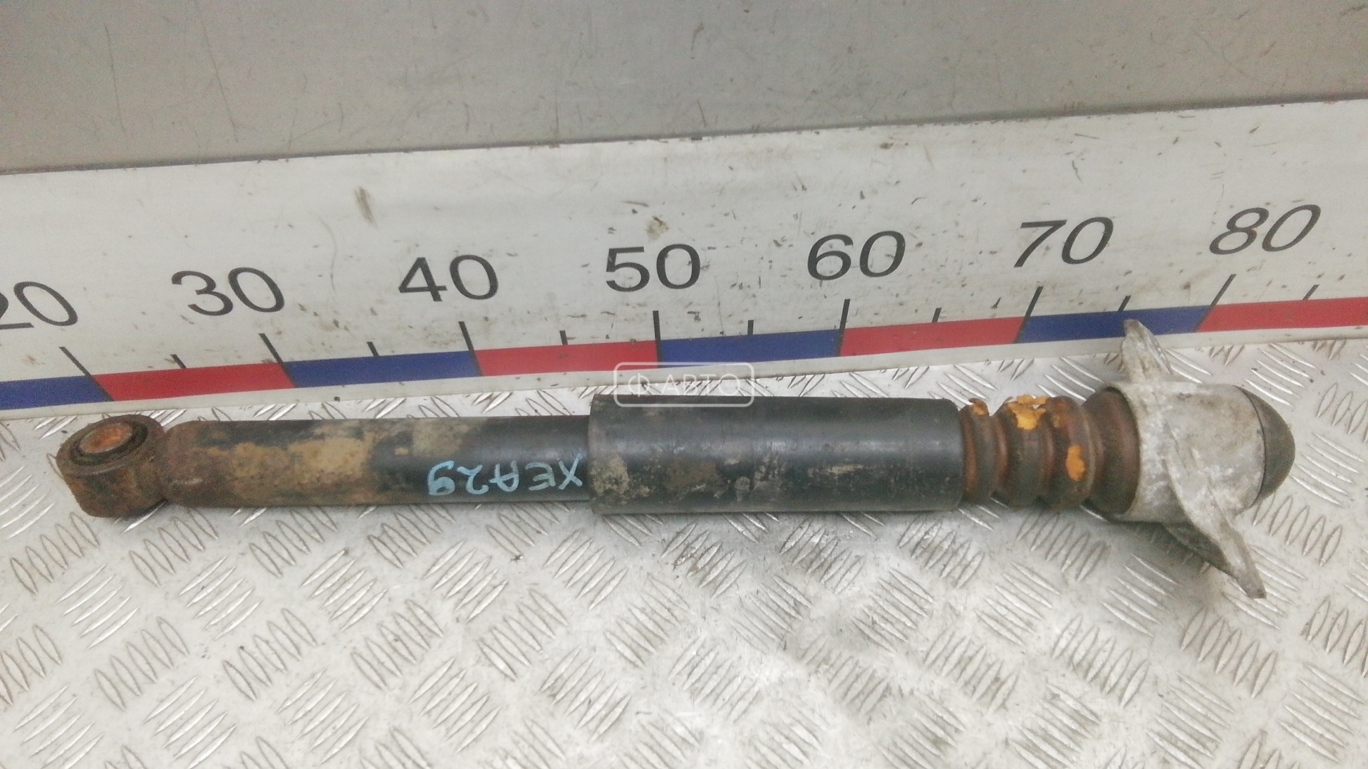 Амортизатор задней балки