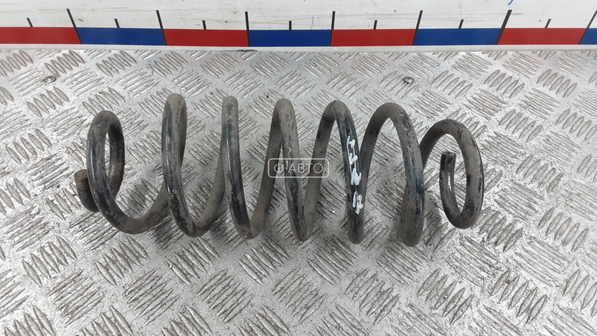 Пружина задняя