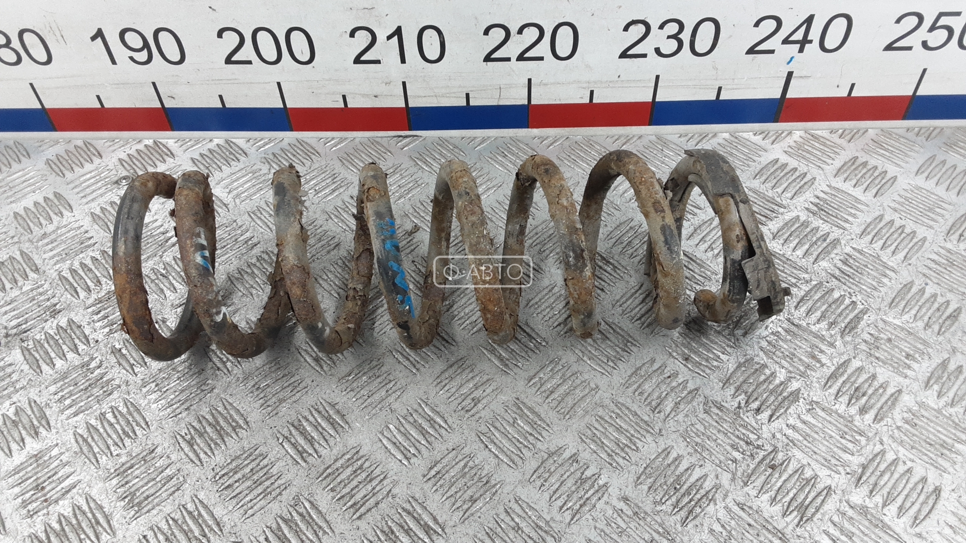 Пружина задняя