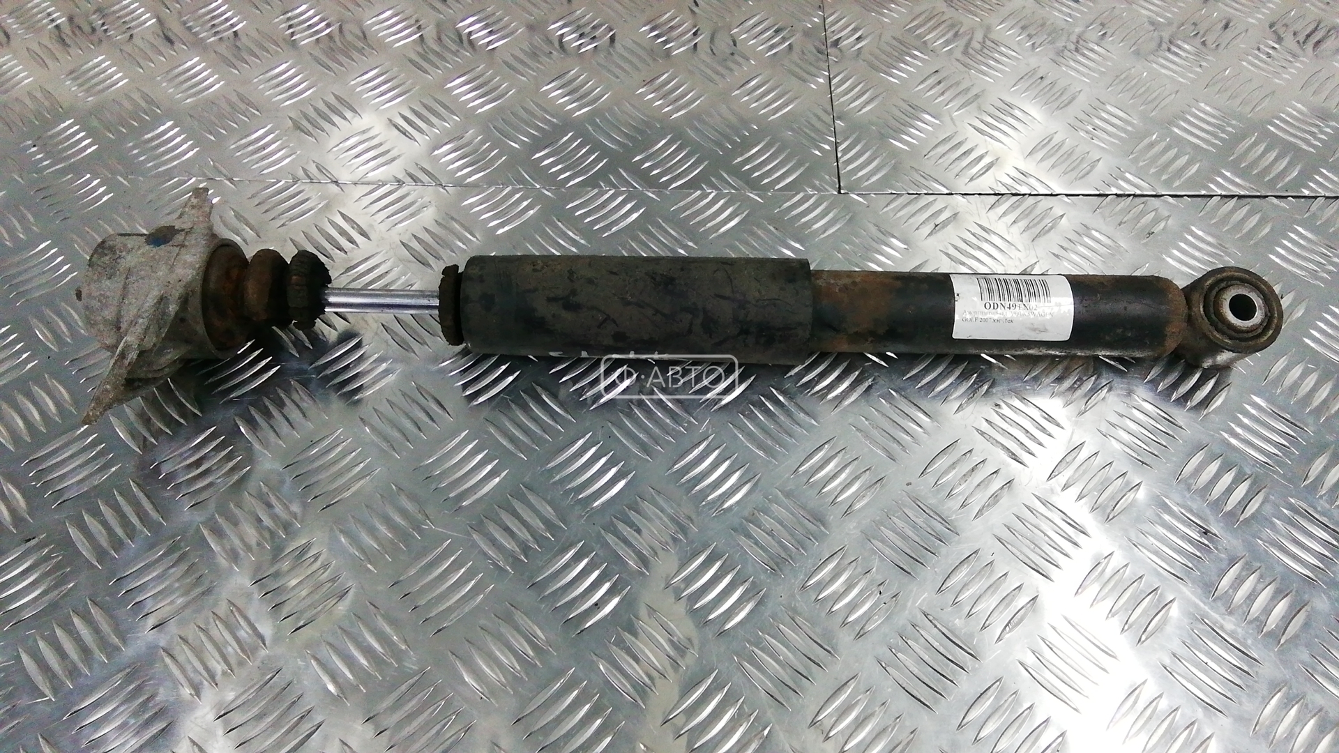 Амортизатор задней балки